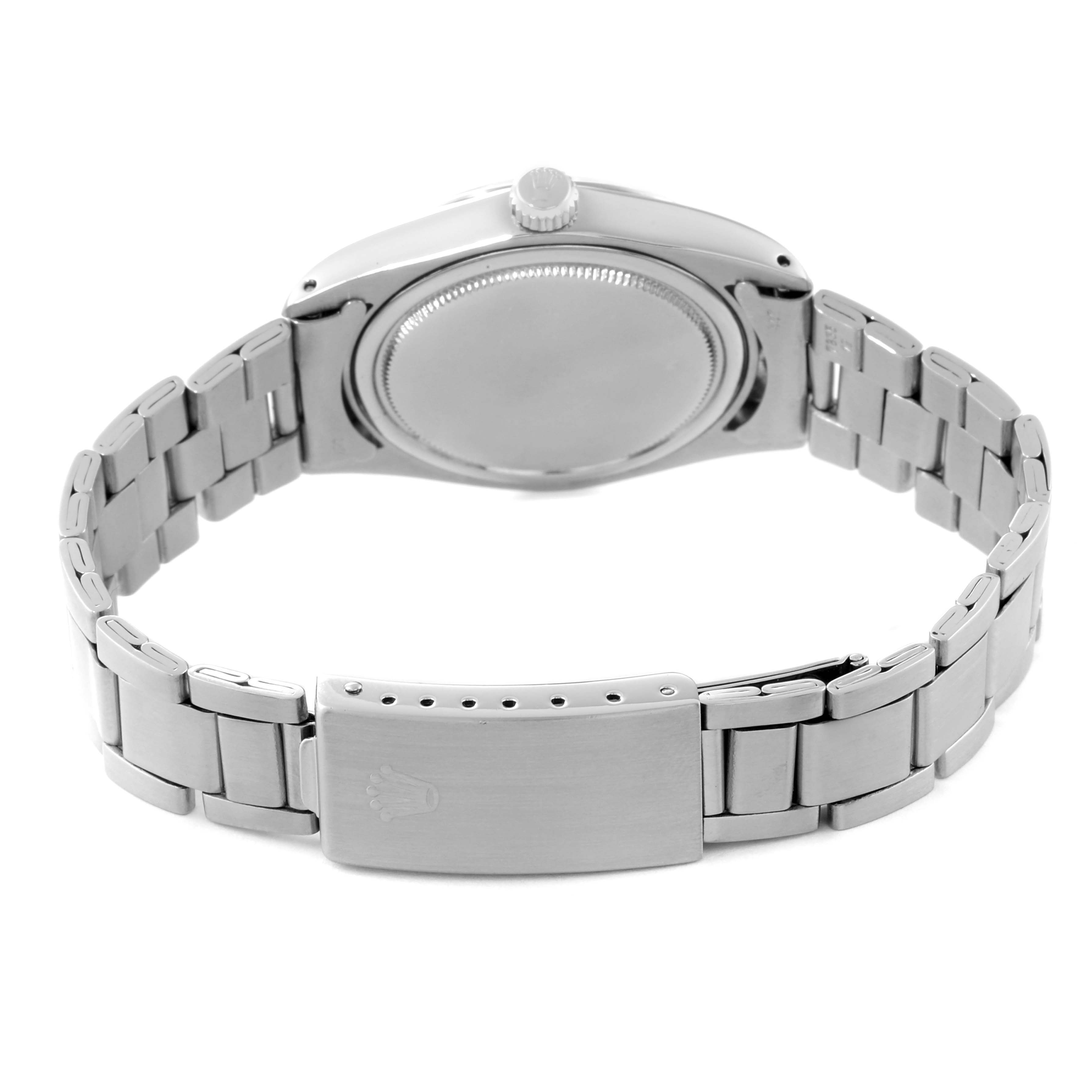 The image shows the back view of a Rolex Vintage Collection 6694 Men's Stainless Steel Silver Dial 6694 Men's Stainless Steel Silver Dial model watch, highlighting the bracelet and clasp.