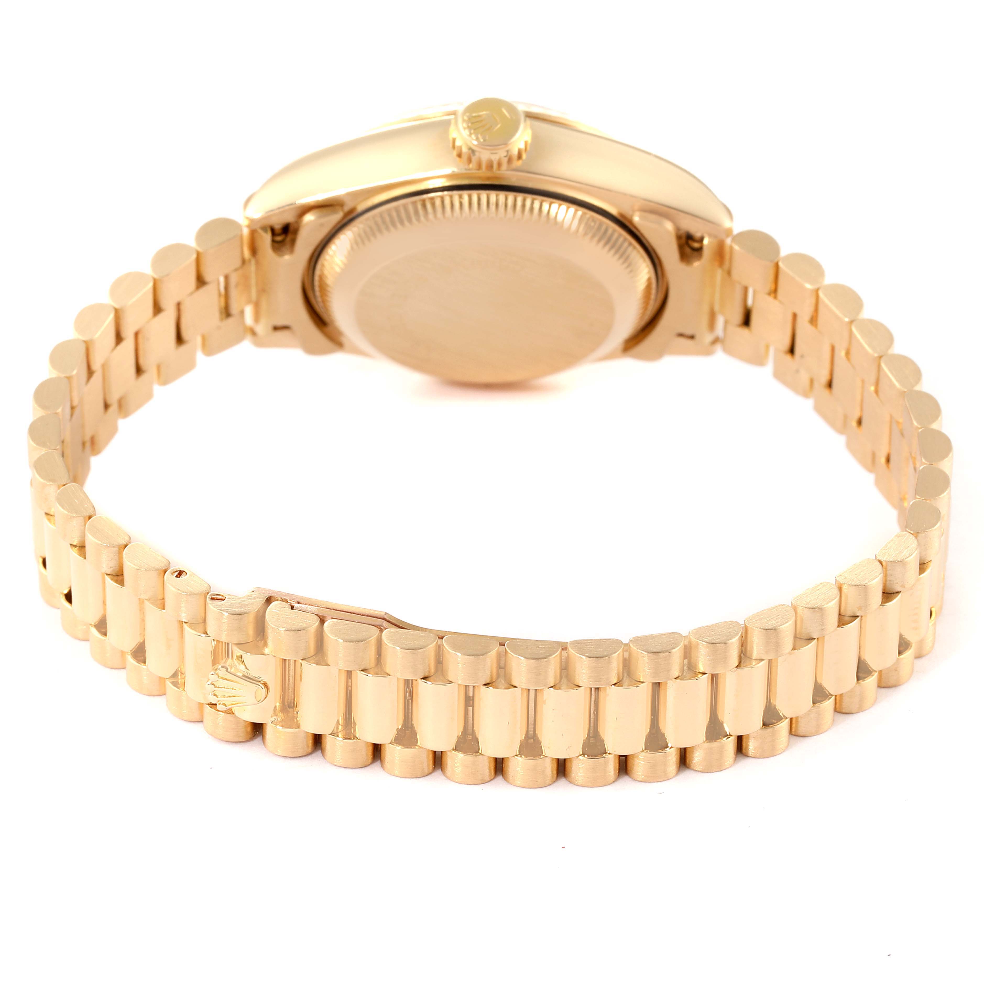 The image shows the back view of a Rolex President 69178 Women
s Yellow Gold Champagne Dial 69178 Women
s Yellow Gold Champagne Dial model watch, highlighting its gold bracelet and case back.
