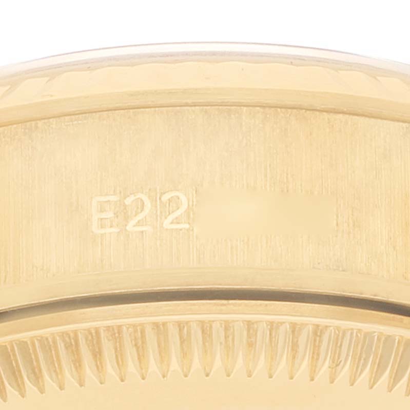 This image shows a close-up of the side case and fluted bezel of a Rolex President 69178 Women
s Yellow Gold Champagne Dial 69178 Women
s Yellow Gold Champagne Dial model watch.