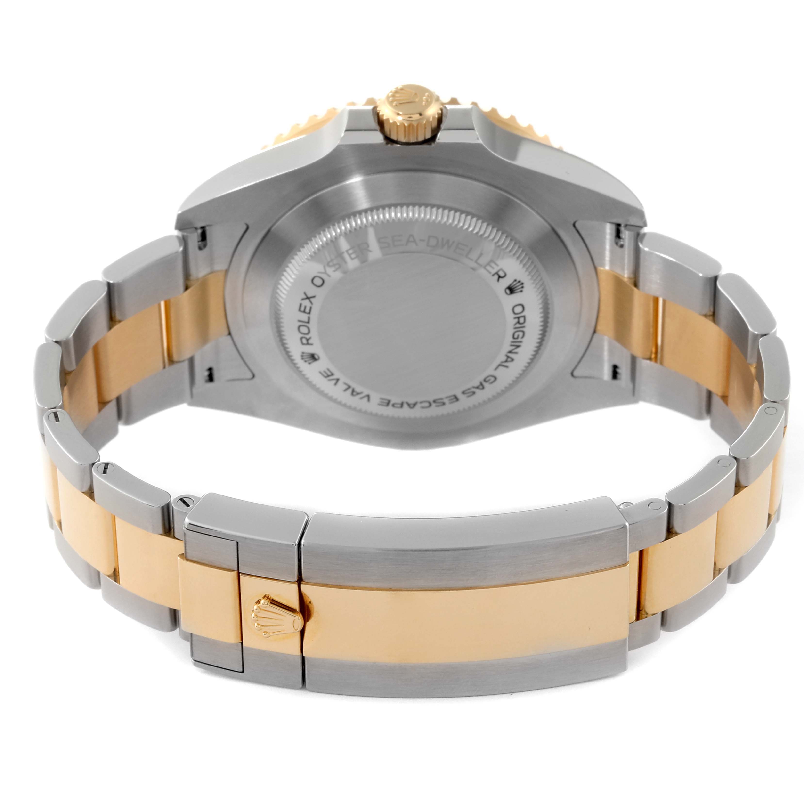 The image shows the back view of a Rolex Sea-Dweller 126603 Men's Steel and Gold (two tone) Black Dial 126603 Men's Steel and Gold (two tone) Black Dial watch, highlighting the case back and two-tone bracelet.