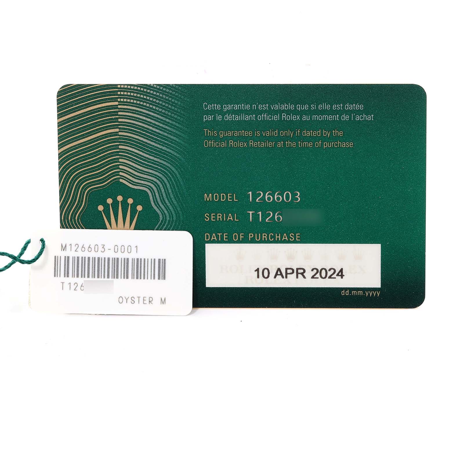 The image shows a warranty card and tag for a Rolex Sea-Dweller 126603 Men's Steel and Gold (two tone) Black Dial 126603 Men's Steel and Gold (two tone) Black Dial model 126603.