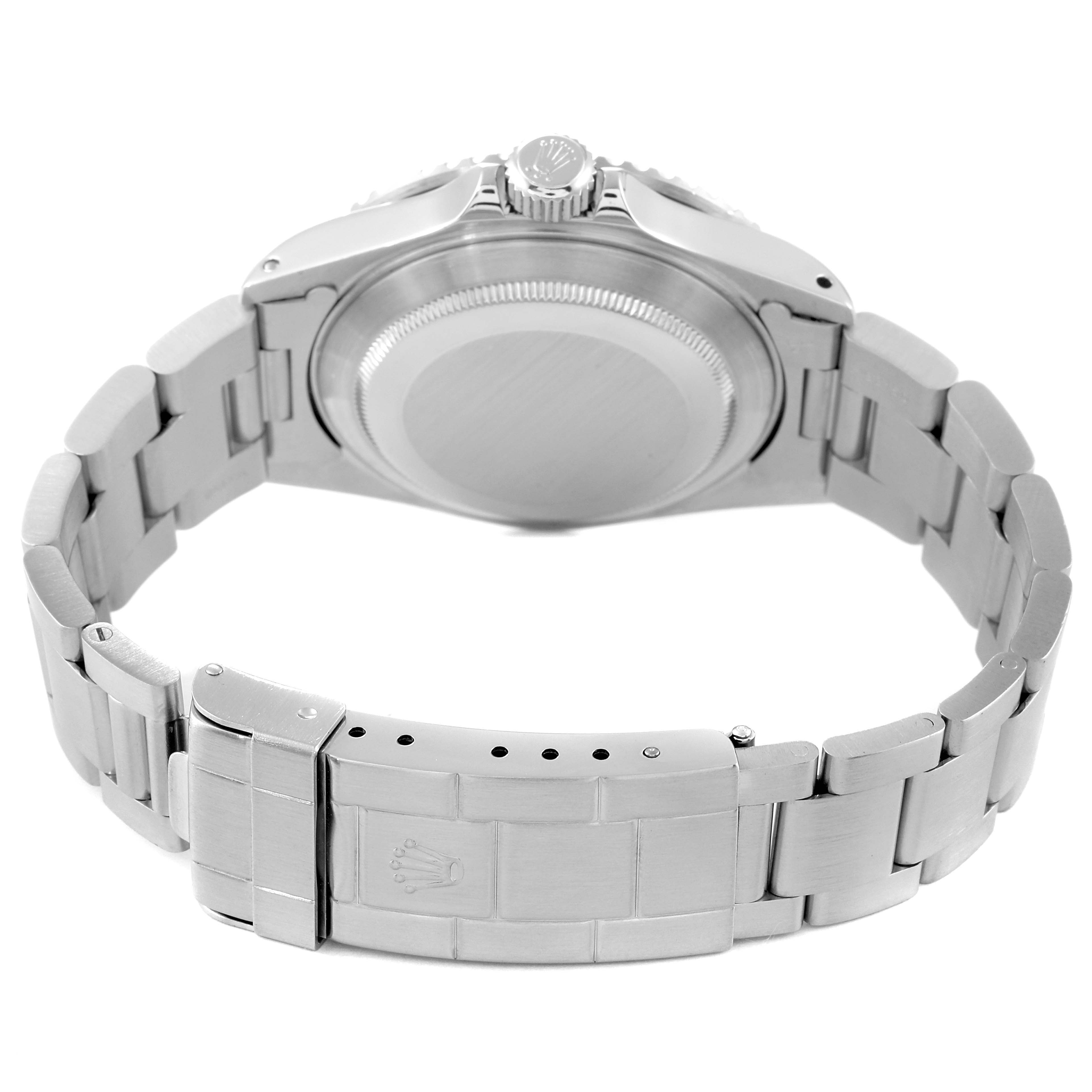 This image shows the back view of a Rolex Submariner 16610 Men
s Stainless Steel Black Dial 16610 Men
s Stainless Steel Black Dial watch, highlighting the case back and bracelet clasp.