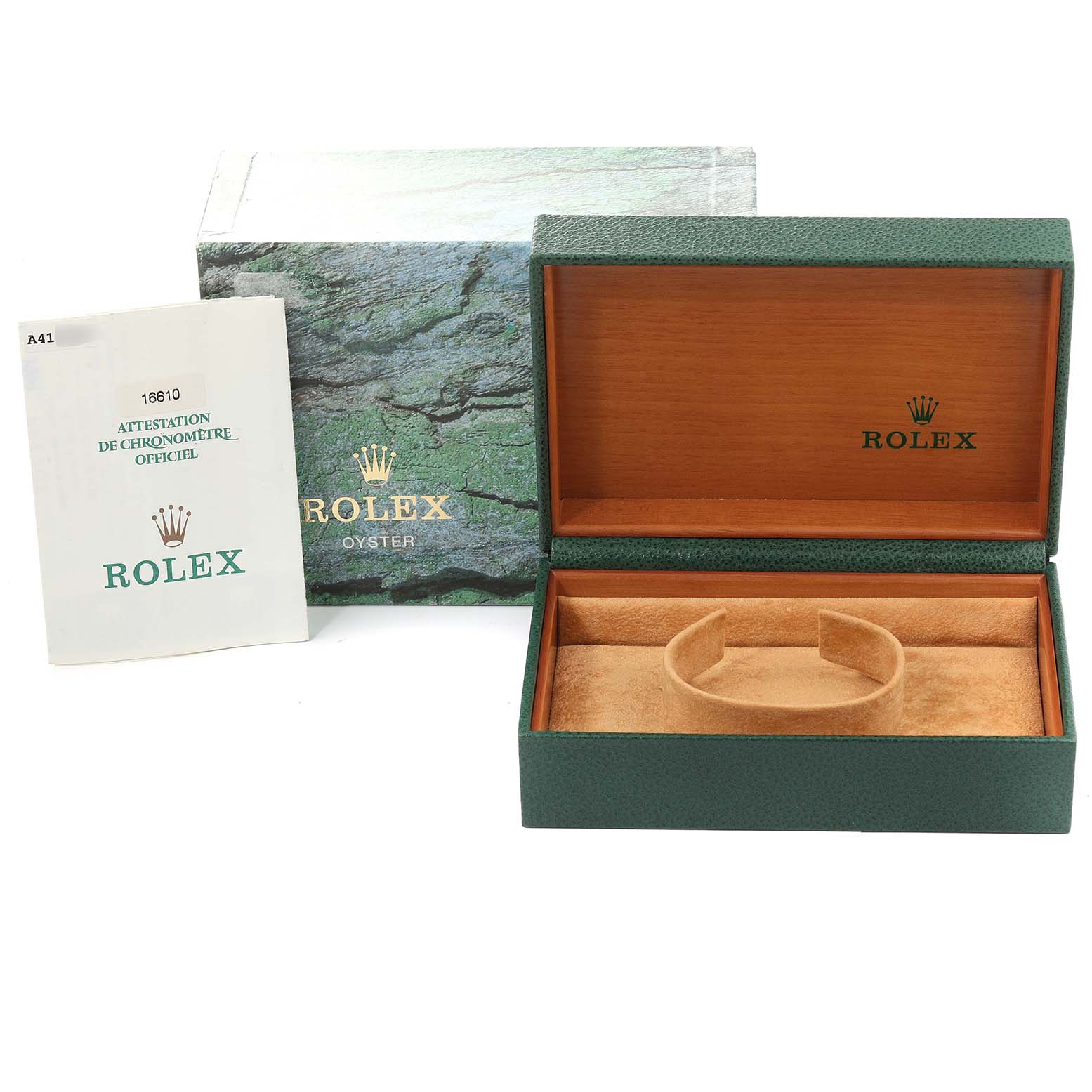 The image shows a Rolex Submariner 16610 Men
s Stainless Steel Black Dial 16610 Men
s Stainless Steel Black Dial watch box, an outer sleeve, and an instruction manual positioned at an angle to showcase all parts.