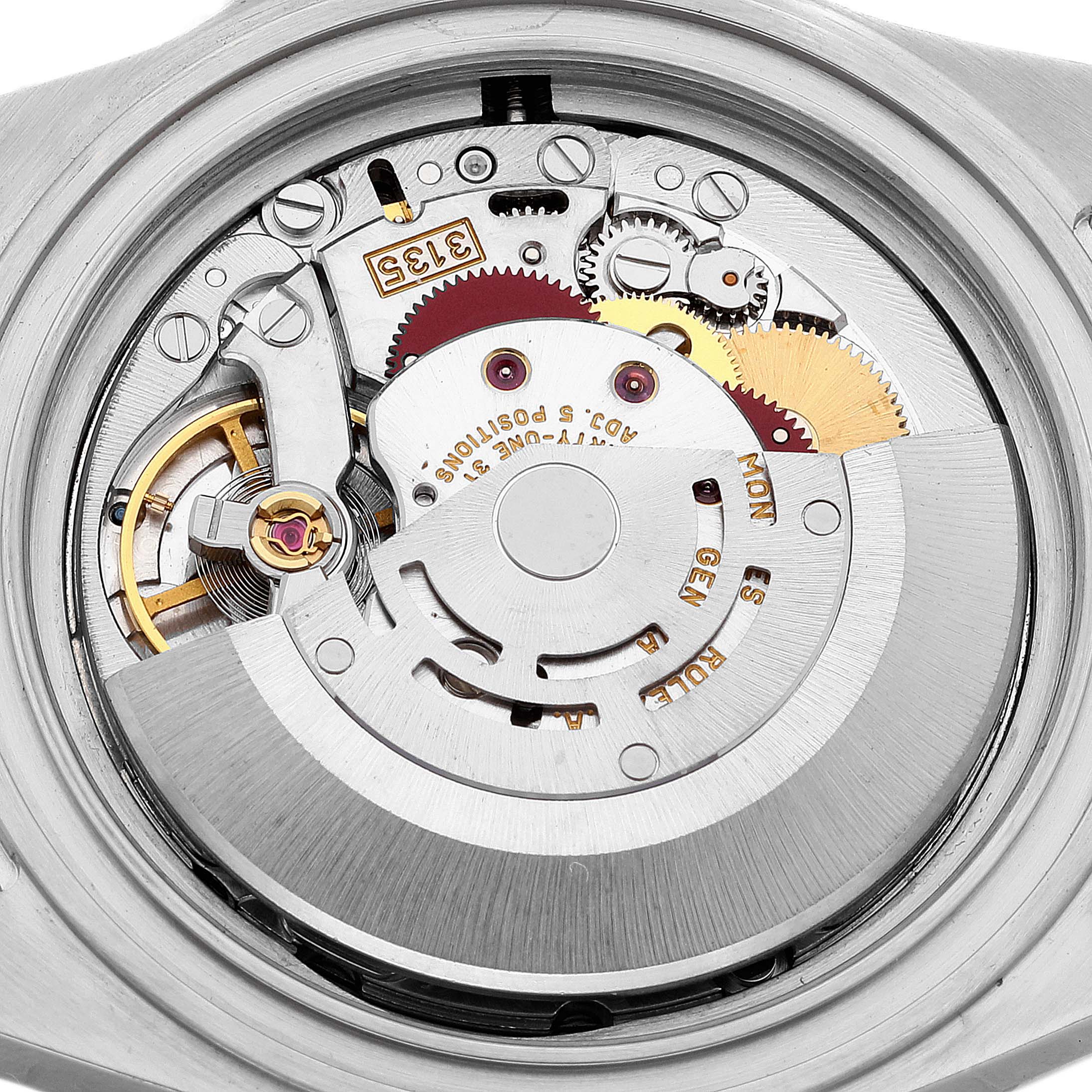 This image shows the internal movement mechanism of a Rolex Submariner 16610 Men
s Stainless Steel Black Dial 16610 Men
s Stainless Steel Black Dial watch taken from the rear angle with the case back removed.