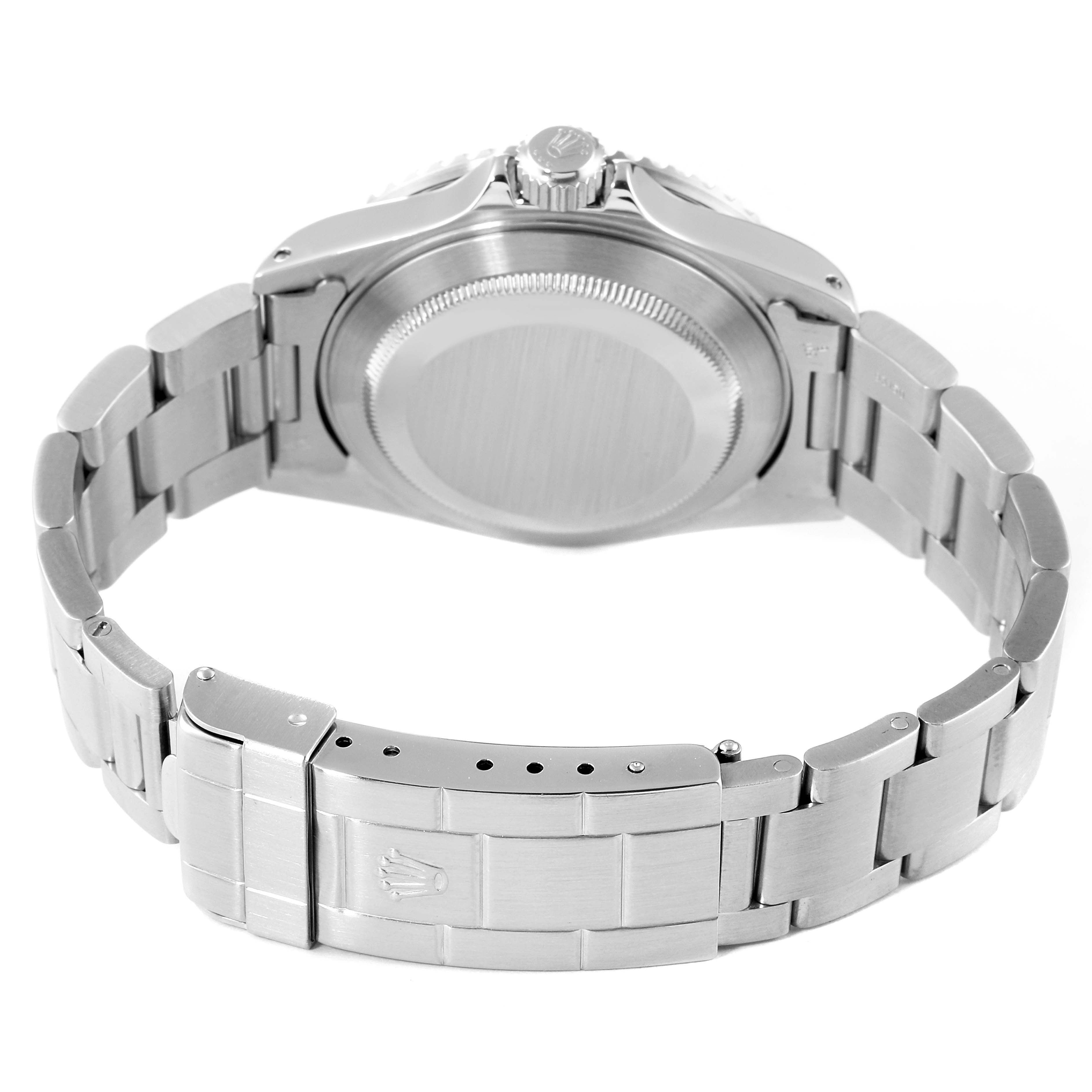 The image shows the back case and bracelet clasp of a Rolex Submariner 16610 Men
s Stainless Steel Black Dial 16610 Men
s Stainless Steel Black Dial watch from a rear angle.