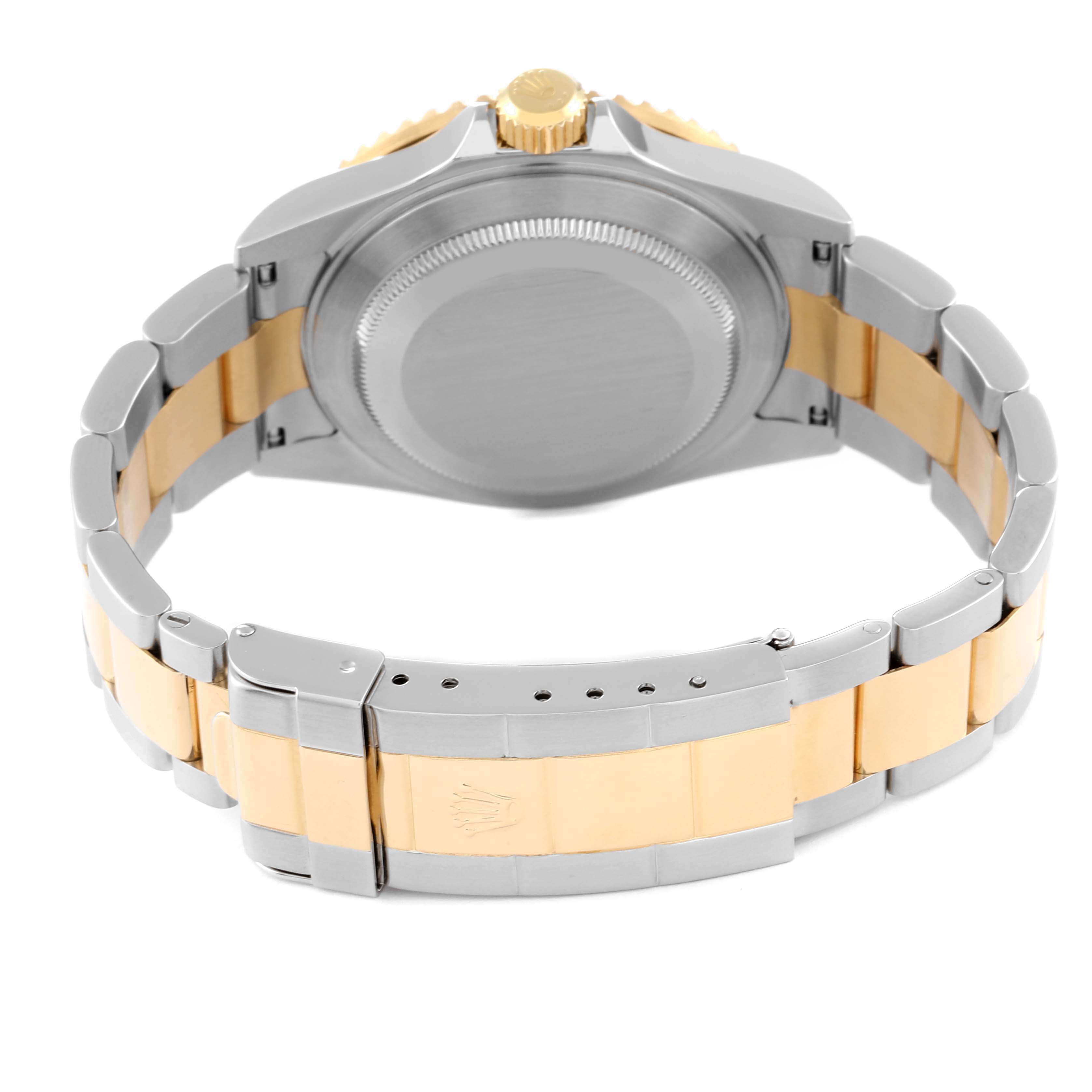 This image shows the back and bracelet of a Rolex Submariner 16613 Men's Steel and Gold (two tone) Blue Dial 16613 Men's Steel and Gold (two tone) Blue Dial, highlighting its two-tone metal finish.