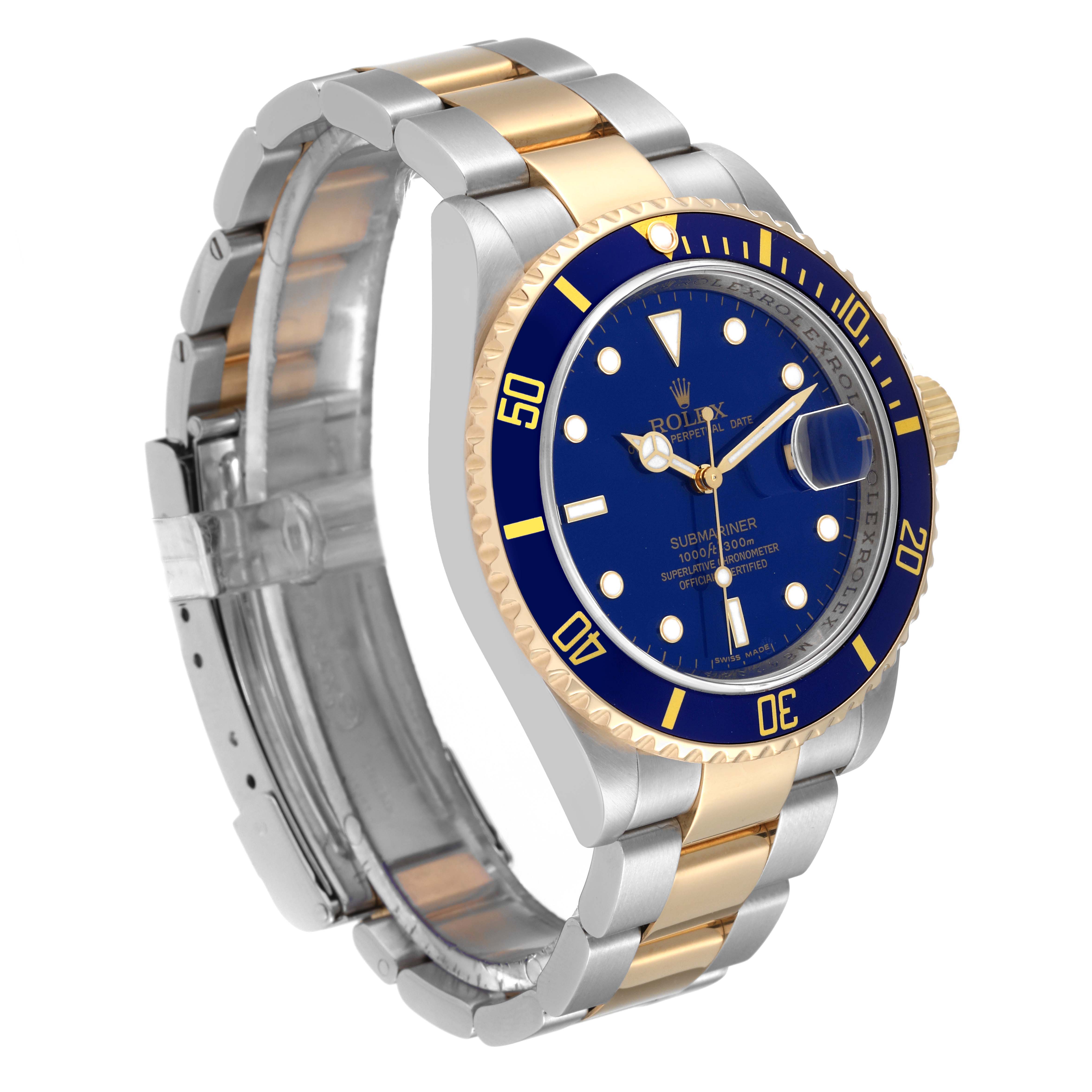 The Rolex Submariner 16613 Men's Steel and Gold (two tone) Blue Dial 16613 Men's Steel and Gold (two tone) Blue Dial watch is shown at an angled side view, highlighting its blue dial, gold bezel, and two-tone bracelet.
