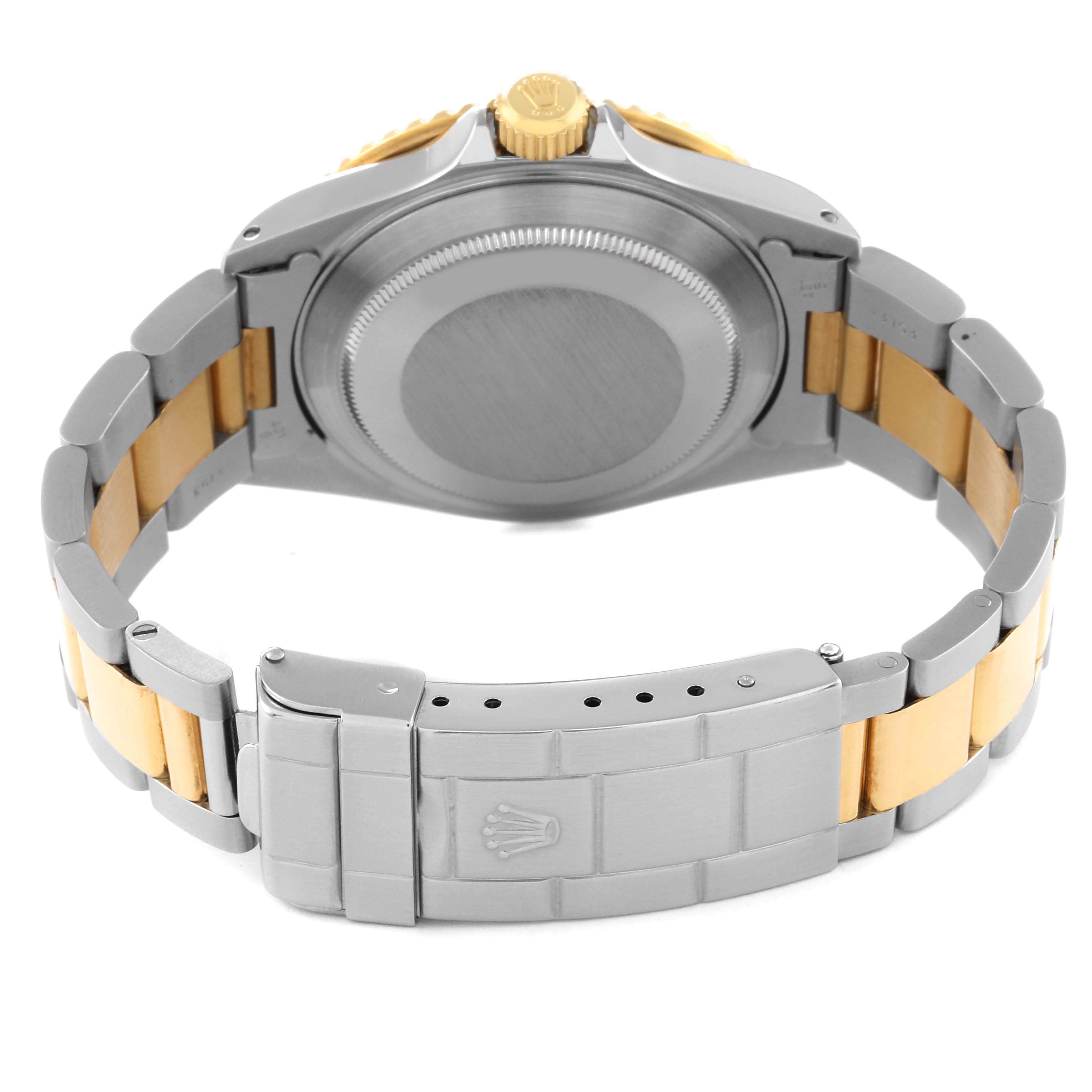 This image shows the backside and bracelet clasp of a Rolex Submariner 16613 Men's Steel and Gold (two tone) Blue Dial 16613 Men's Steel and Gold (two tone) Blue Dial watch, highlighting the two-tone band and crown.