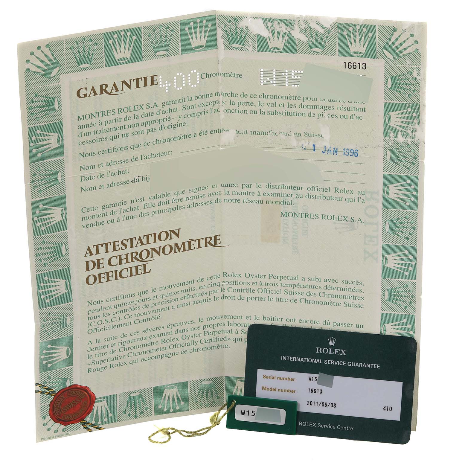The image shows the guarantee and international service guarantee papers for the Rolex Submariner 16613 Men's Steel and Gold (two tone) Blue Dial 16613 Men's Steel and Gold (two tone) Blue Dial model.