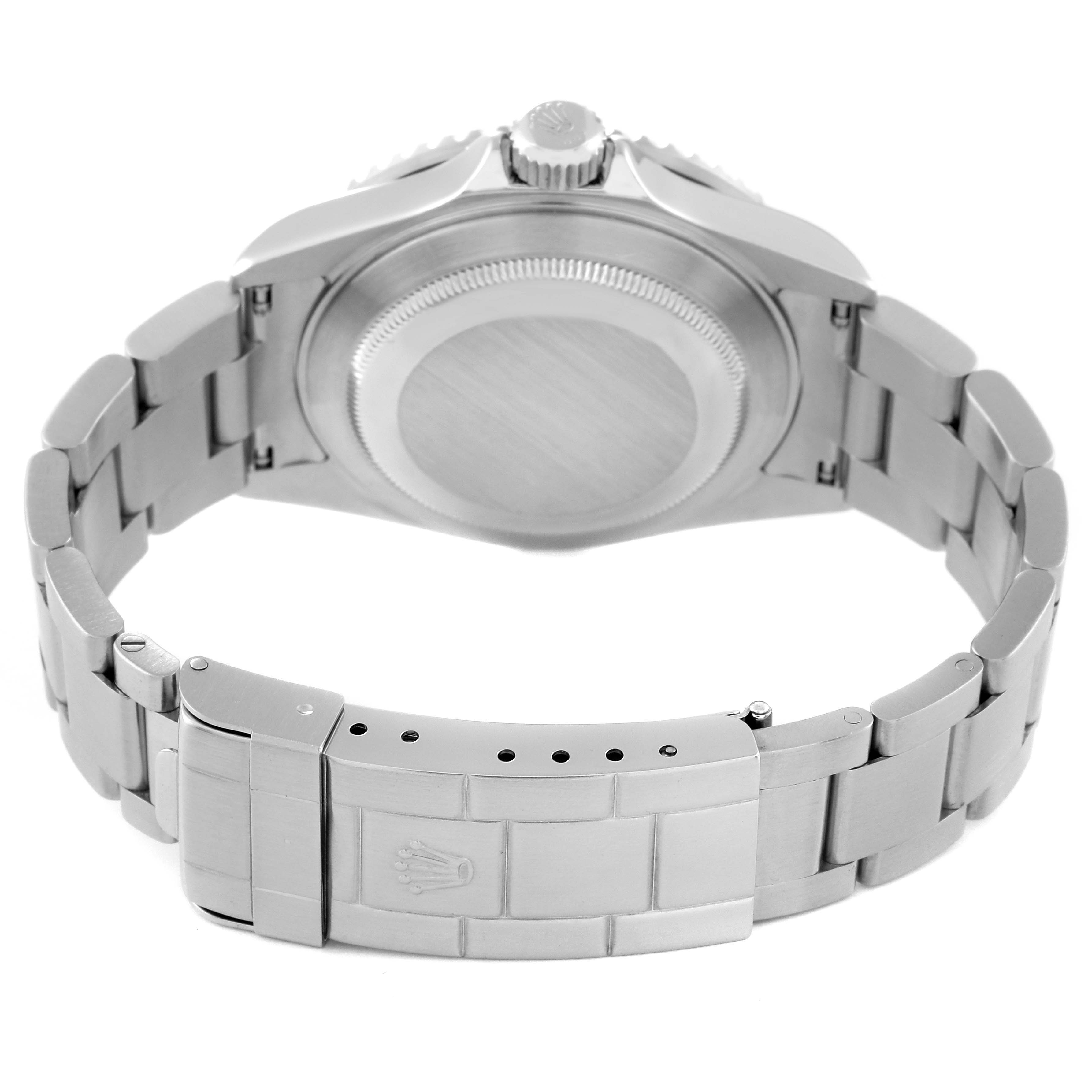 The image shows the back view of a Rolex Submariner 16610 Men
s Stainless Steel Black Dial 16610 Men
s Stainless Steel Black Dial watch, including its case back and bracelet with the clasp.