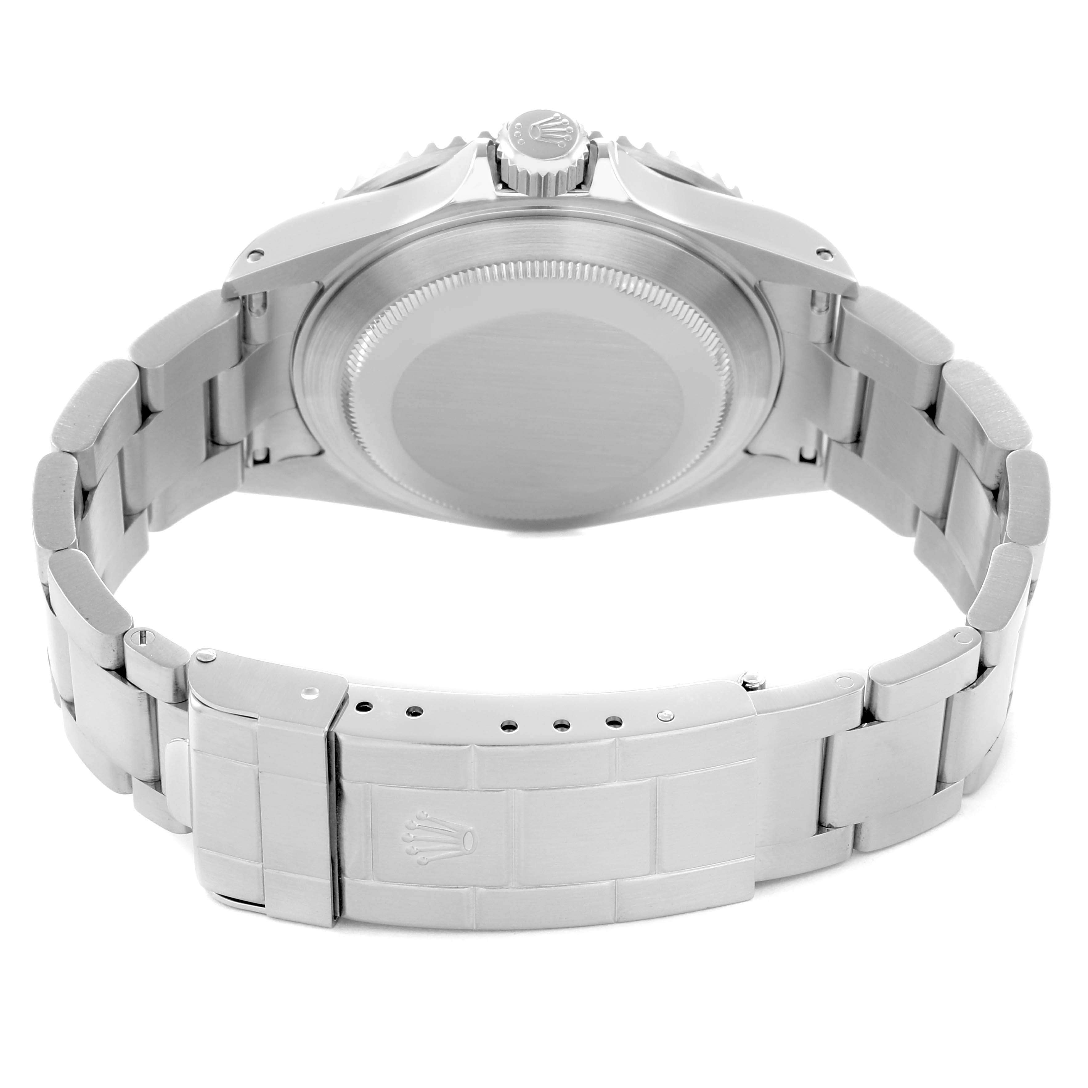 The image shows the back view of a Rolex Submariner model 16610 men
s watch, highlighting the case back, bracelet, and clasp.