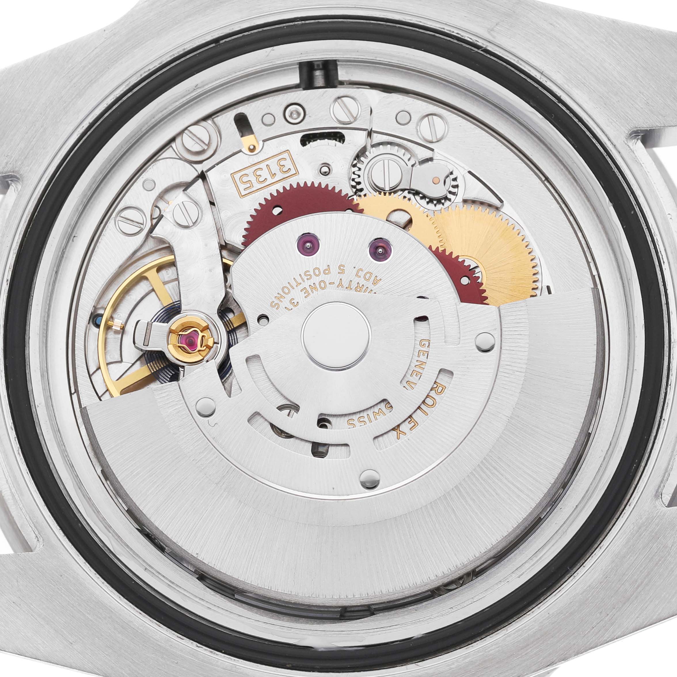 The image shows the movement and internal mechanism of a Rolex Submariner 116610LV Men's Stainless Steel Green Dial watch from a back view.