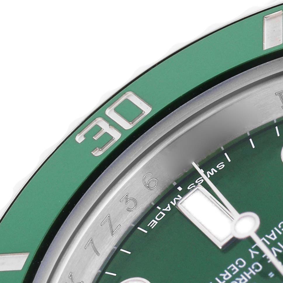 The image shows a close-up of the Rolex Submariner 116610LV Men's Stainless Steel Green Dial's green bezel and part of the watch face, including the "30" marker.