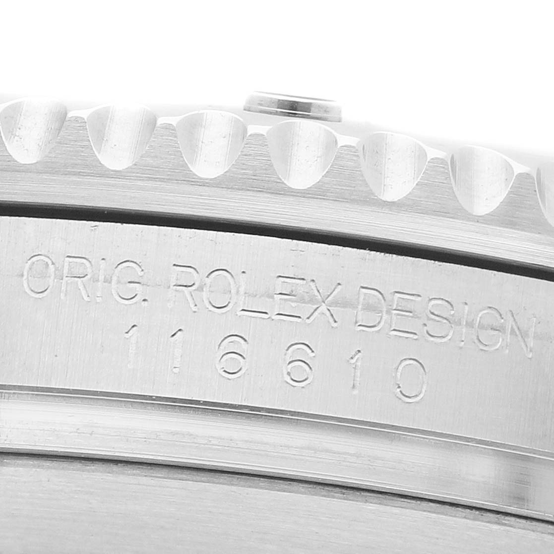 The image shows a close-up of the side engraving on the bezel of a Rolex Submariner 116610LV Men's Stainless Steel Green Dial, highlighting "ORIG. ROLEX DESIGN" and the model number.