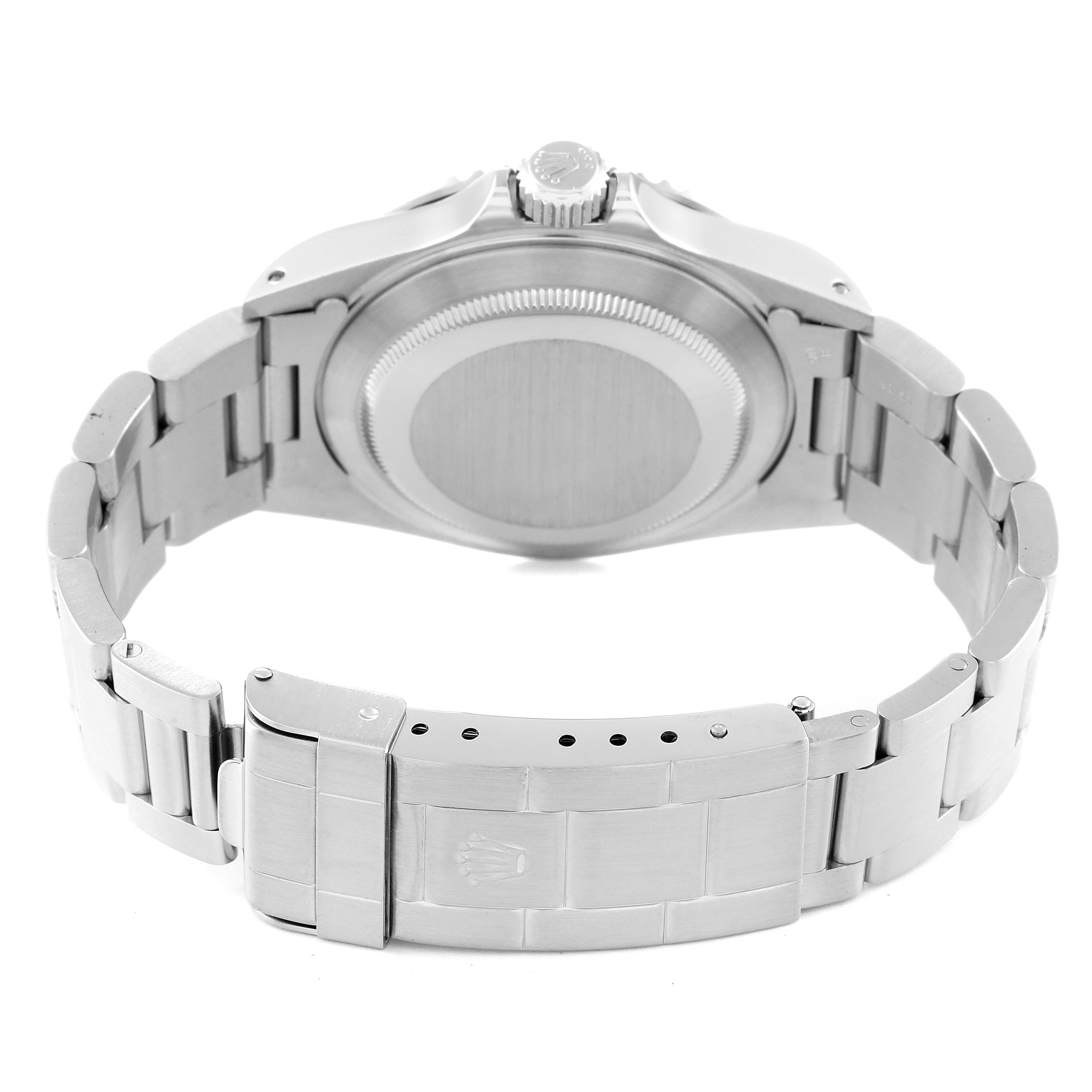 The image shows the backside and bracelet clasp of a Rolex Submariner 14060 Men
s Stainless Steel Black Dial 14060 Men
s Stainless Steel Black Dial watch, highlighting the case back and metallic bracelet.