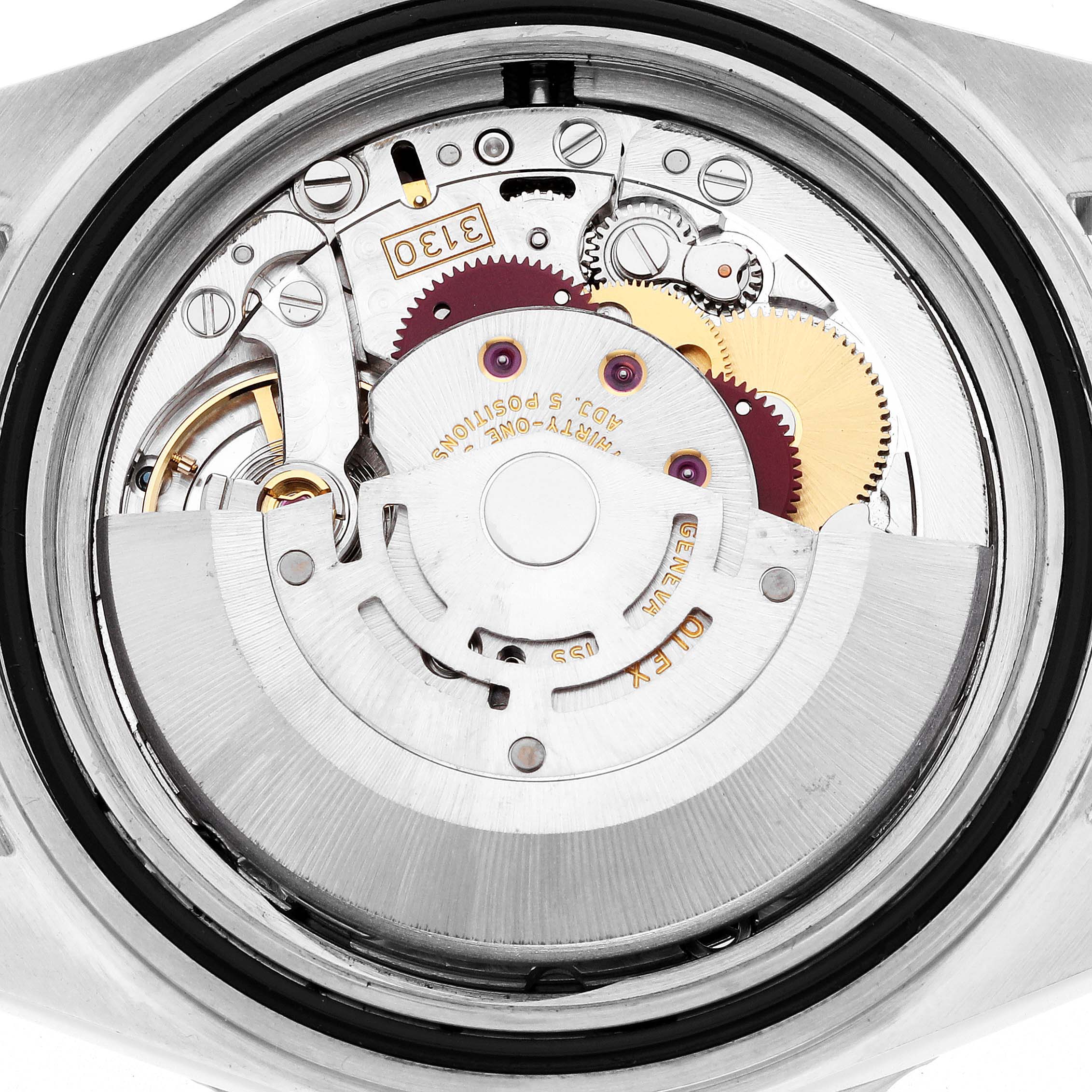 The image shows the movement and internal mechanics of a Rolex Submariner model 14060M, viewed from the back with the case opened.