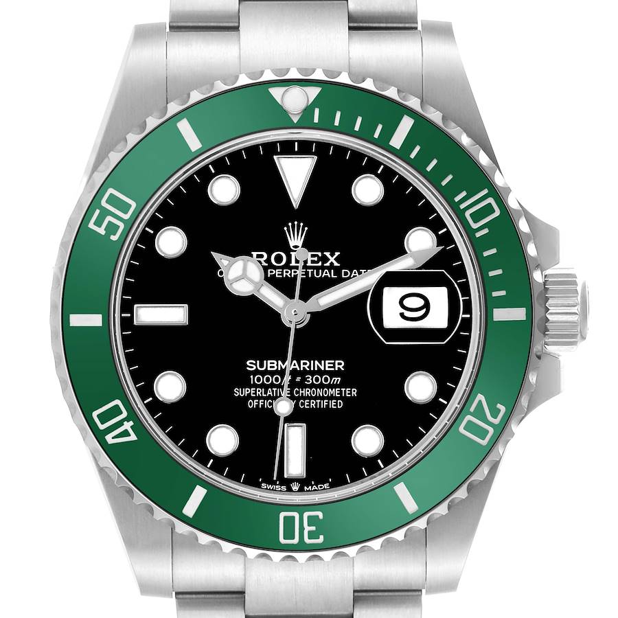 The image shows a Rolex Submariner model 126610 viewed from the front, displaying the green bezel, black dial, date window, and the crown on the side.