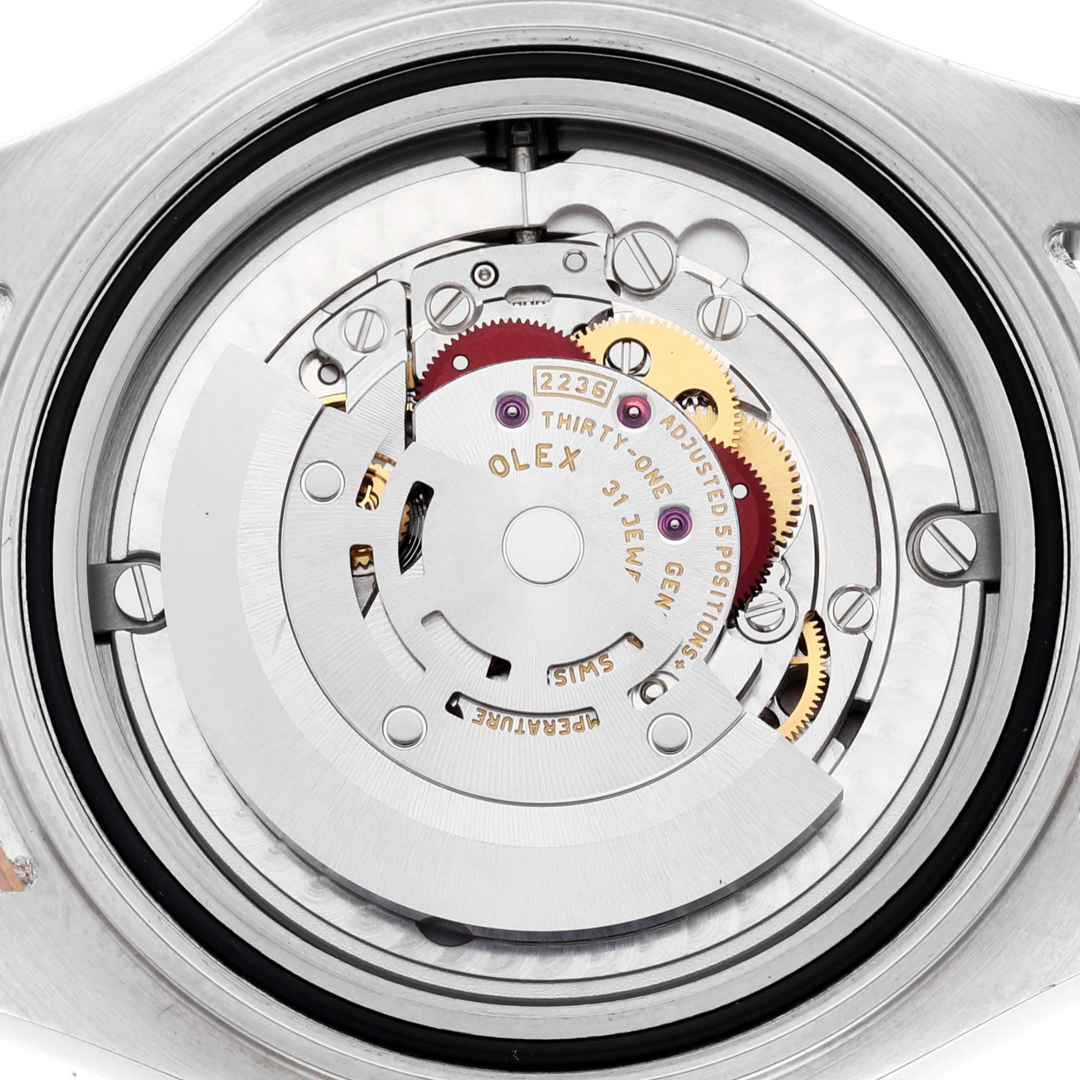 The image shows a close-up view of the movement mechanism of a Rolex Yacht-Master 268621 Men
s Steel and Gold (two tone) Black Dial 268621 Men
s Steel and Gold (two tone) Black Dial watch.