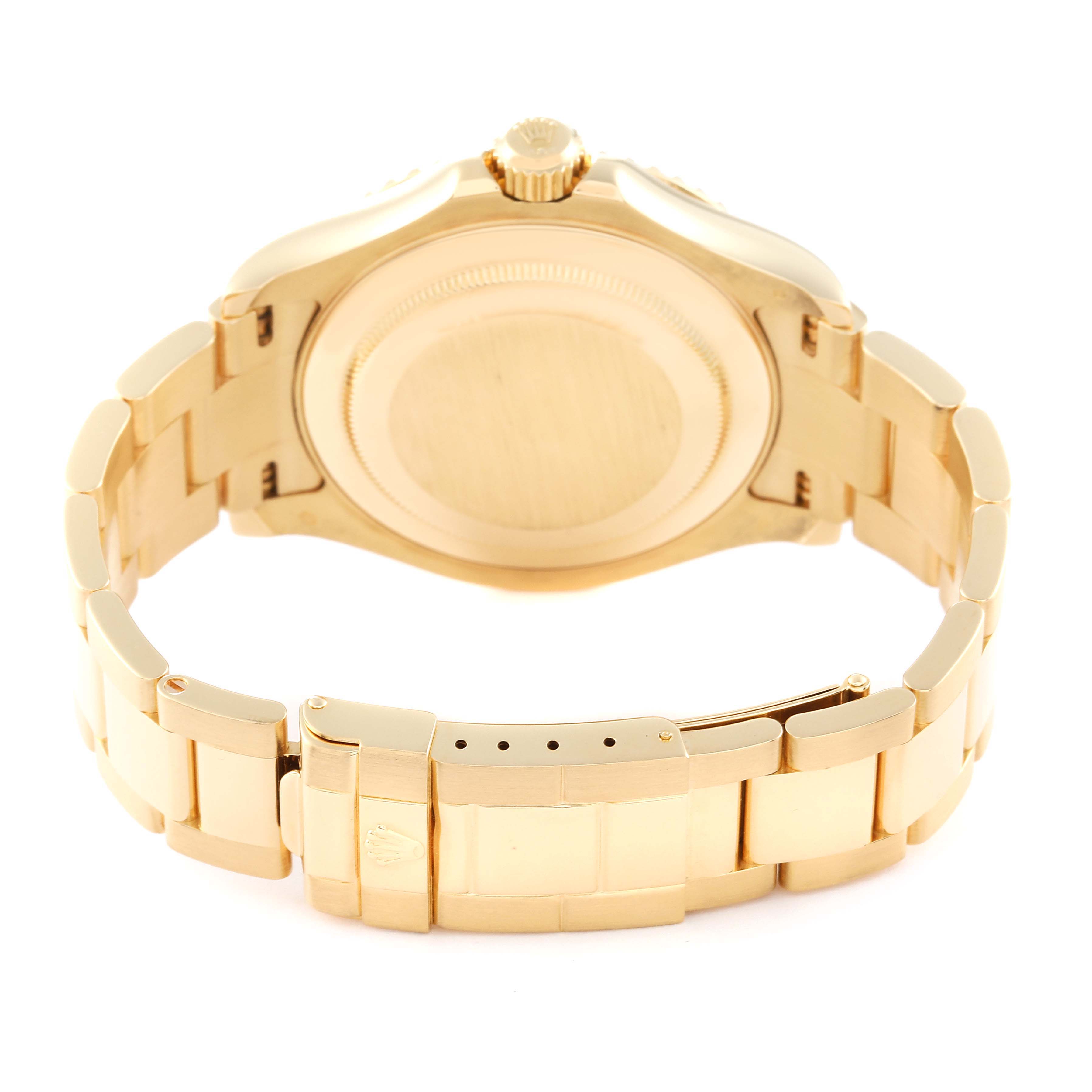 This image shows the back view of a Rolex Yacht-Master 16628 Men's Yellow Gold White Dial 16628 Men's Yellow Gold White Dial watch, highlighting its clasp, bracelet, and case back.