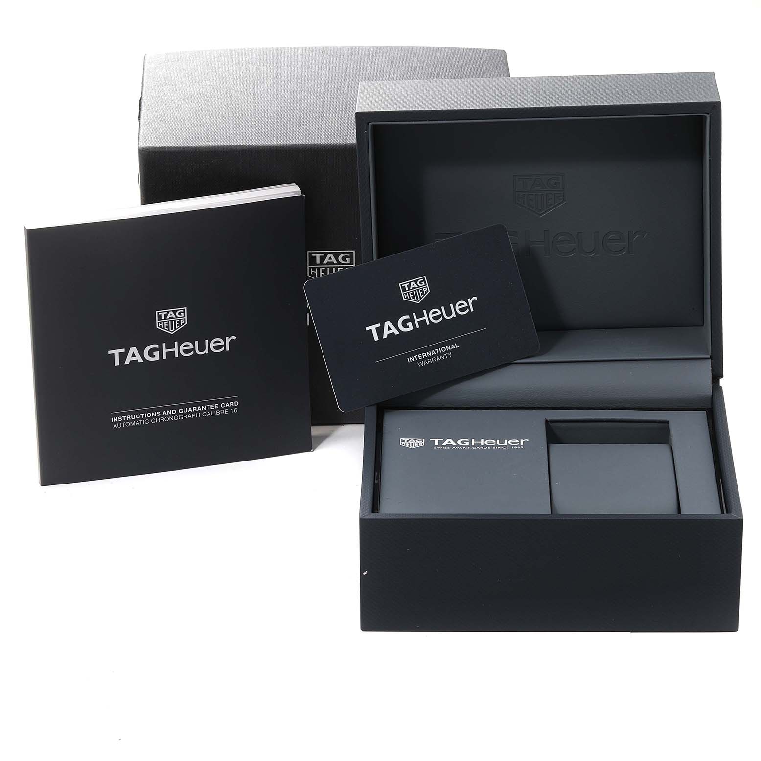 The image shows the packaging for the Tag Heuer Limited Edition model, including the box, warranty card, and instruction manual.