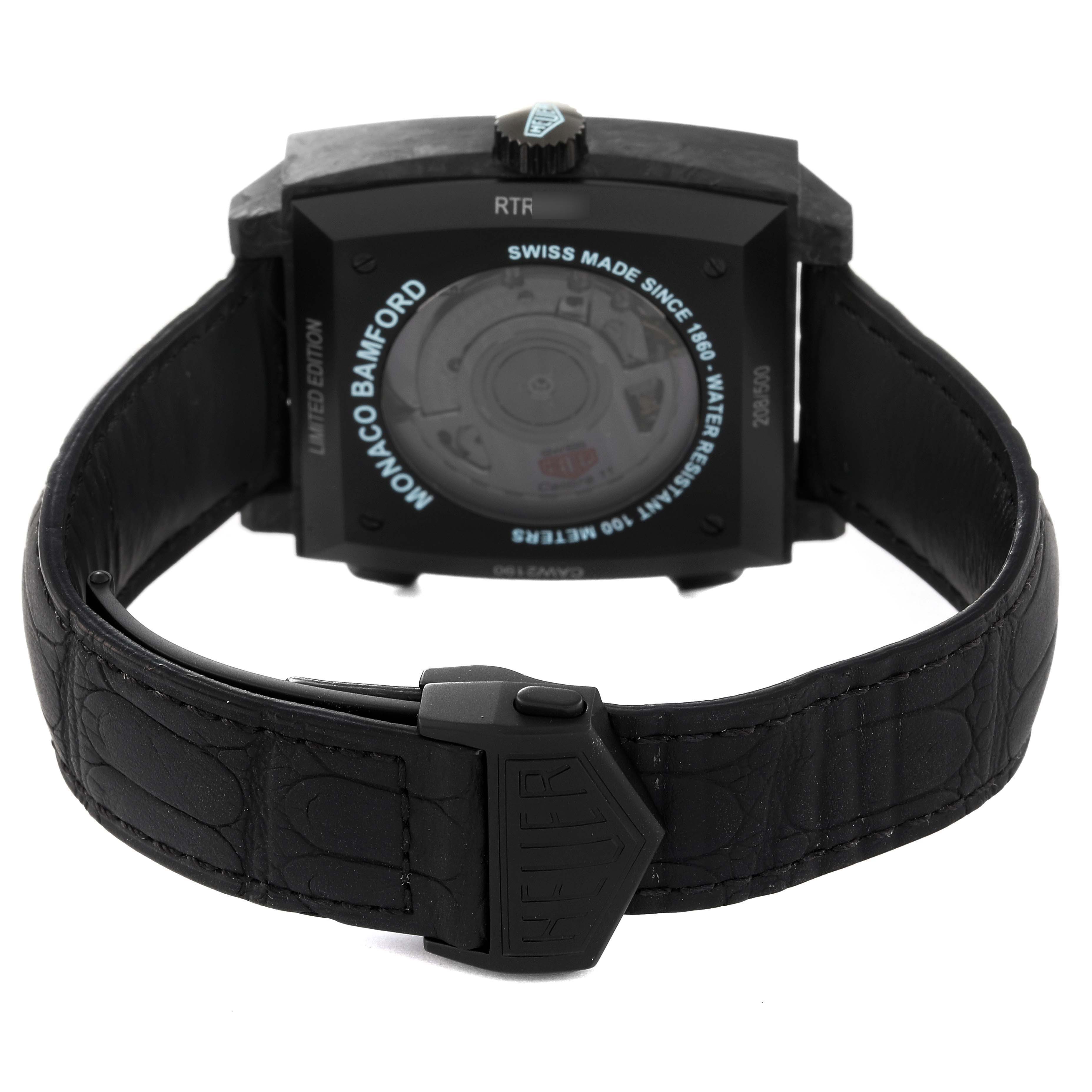 The image shows the back of the Tag Heuer Monaco CAW2190.FC6437 Men's Ceramic Black Dial CAW2190.FC6437 Men's Ceramic Black Dial Bamford Limited Edition watch, highlighting its strap, case back, and clasp.