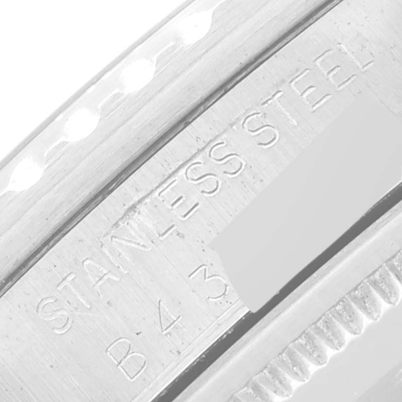 The close-up image shows the stainless steel case back of the Tudor Submariner 75090 Men's Stainless Steel Black Dial 75090 Men's Stainless Steel Black Dial watch, highlighting engravings.