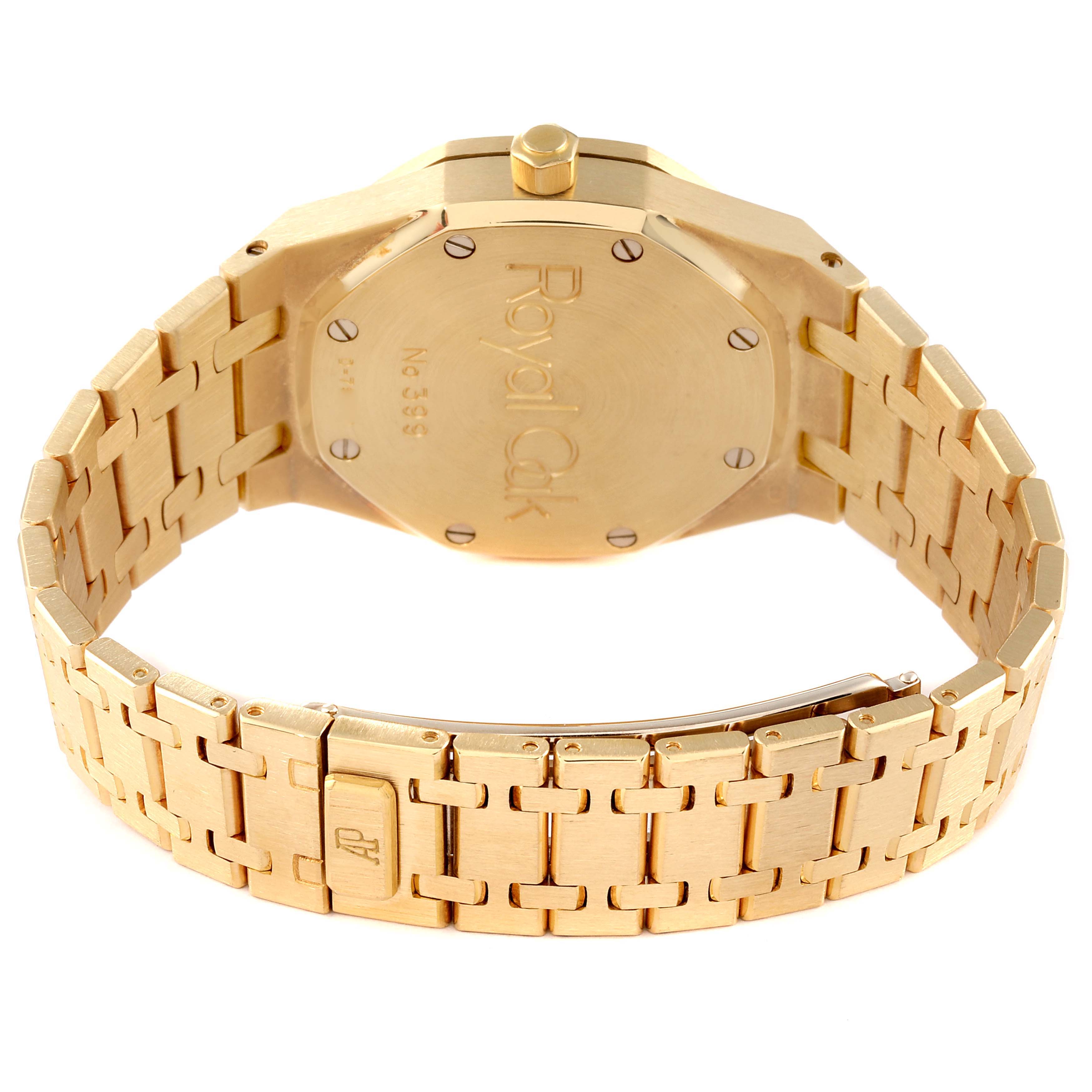 This image shows the back view of a gold Audemars Piguet Royal Oak 25730BA Men's Yellow Gold Black Dial 25730BA Men's Yellow Gold Black Dial watch, focusing on the case back and bracelet.