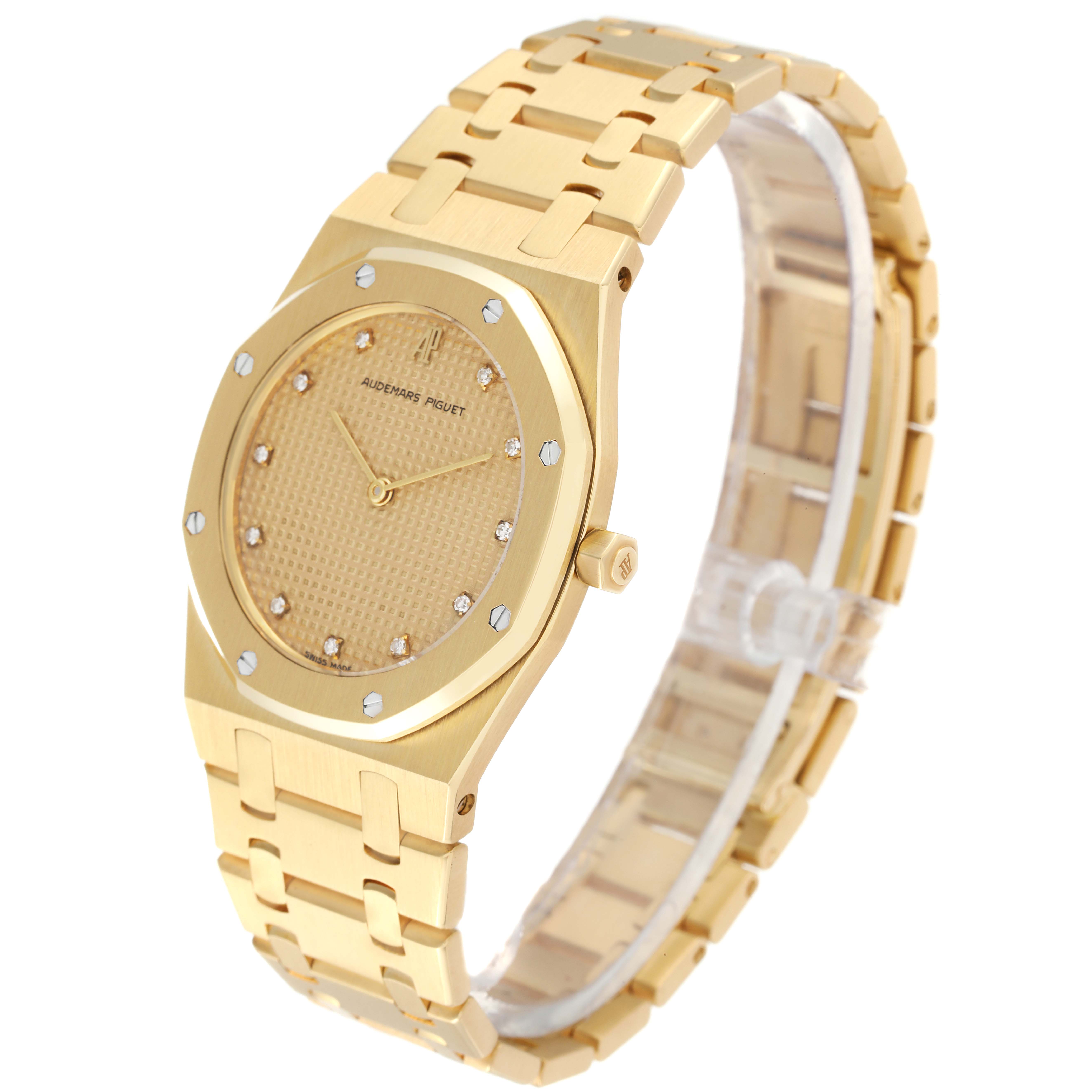The image shows a golden Audemars Piguet Royal Oak 56303BA Men's Yellow Gold Champagne Dial 56303BA Men's Yellow Gold Champagne Dial watch at a slight angle, displaying its face, bezel, crown, and bracelet.