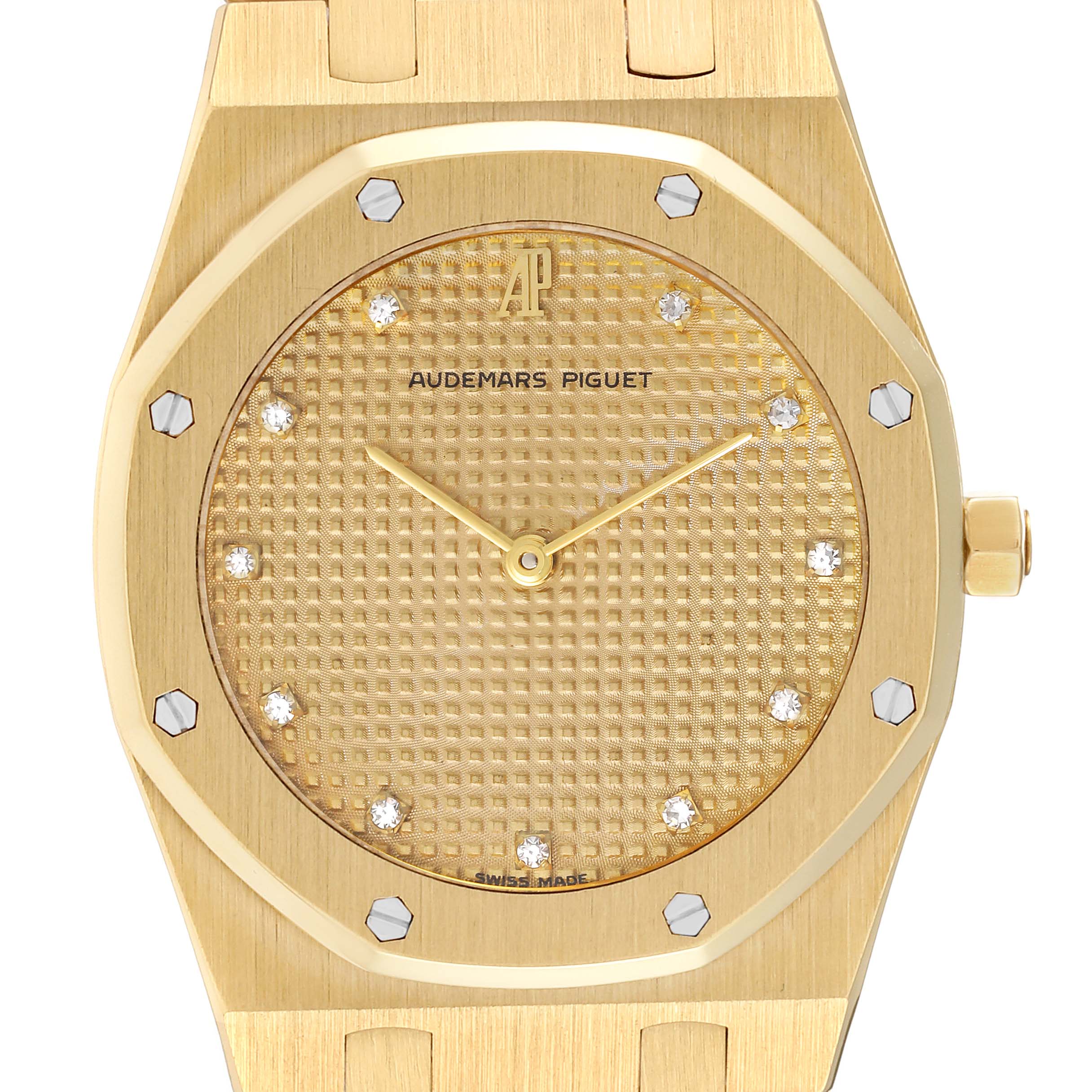 This image shows a close-up of the dial and bezel of a Royal Oak model by Audemars Piguet, highlighting the details and material.