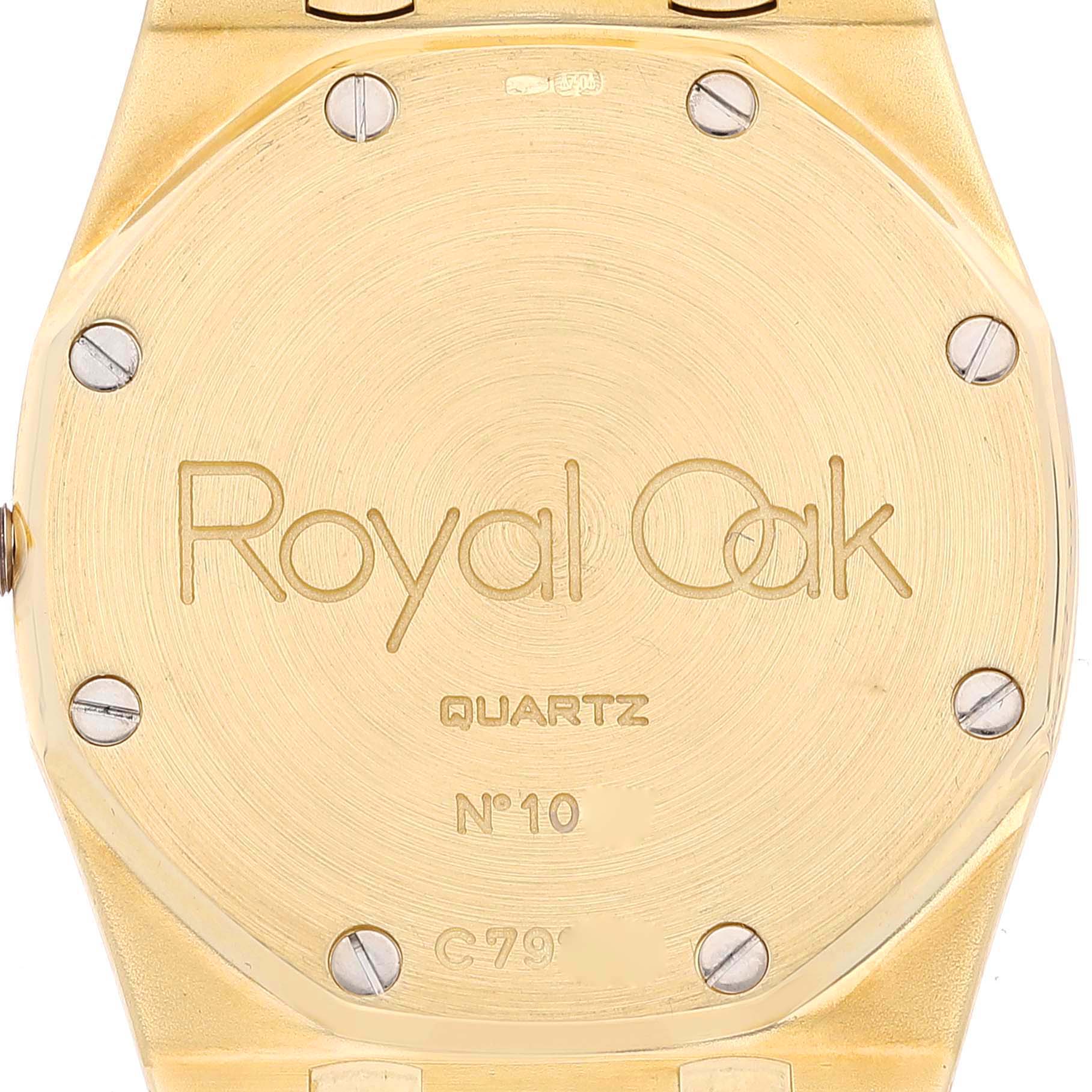 The image shows the back case of an Audemars Piguet Royal Oak 56303BA Men's Yellow Gold Champagne Dial 56303BA Men's Yellow Gold Champagne Dial watch.