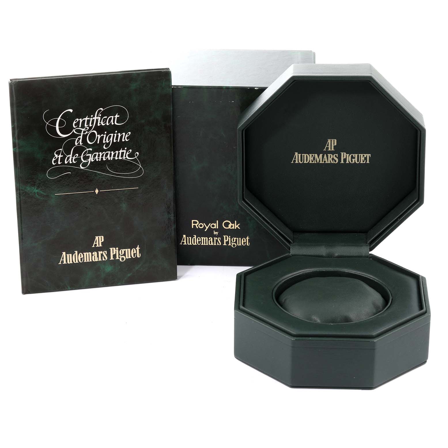 The image shows the box, user manual, and certificate for a Royal Oak model by Audemars Piguet.