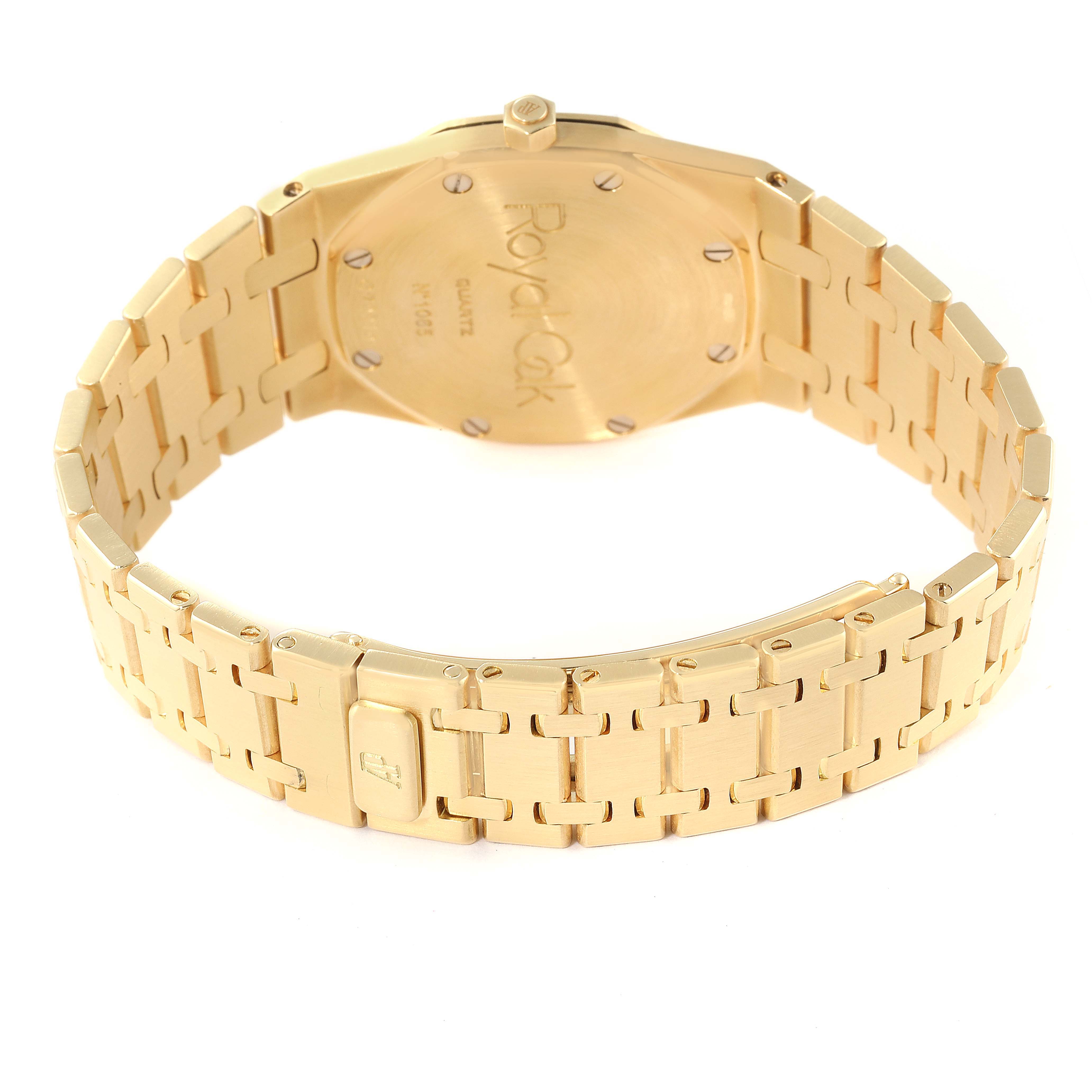 This image shows the rear view and bracelet of a Royal Oak watch by Audemars Piguet in gold.