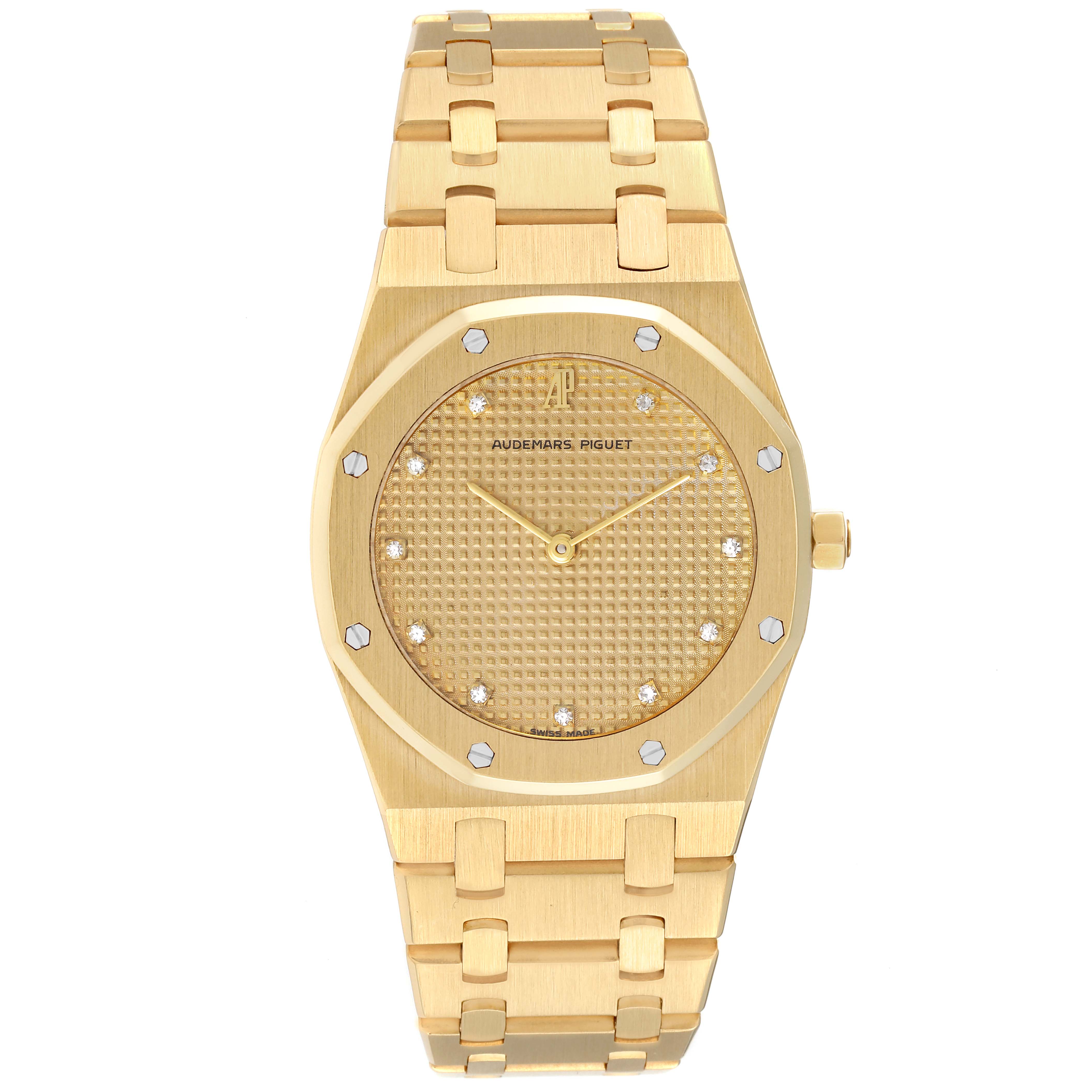 This is a front view of the Audemars Piguet Royal Oak 56303BA Men's Yellow Gold Champagne Dial 56303BA Men's Yellow Gold Champagne Dial watch showing the dial, hands, bezel, and bracelet.