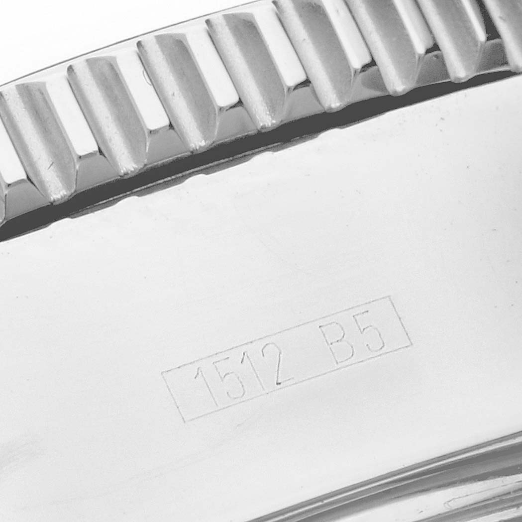The image shows a close-up of the bezel and case back of a Breitling Superocean A13341 Men's Stainless Steel Black Dial A13341 Men's Stainless Steel Black Dial watch with the engraving "1512 B5".
