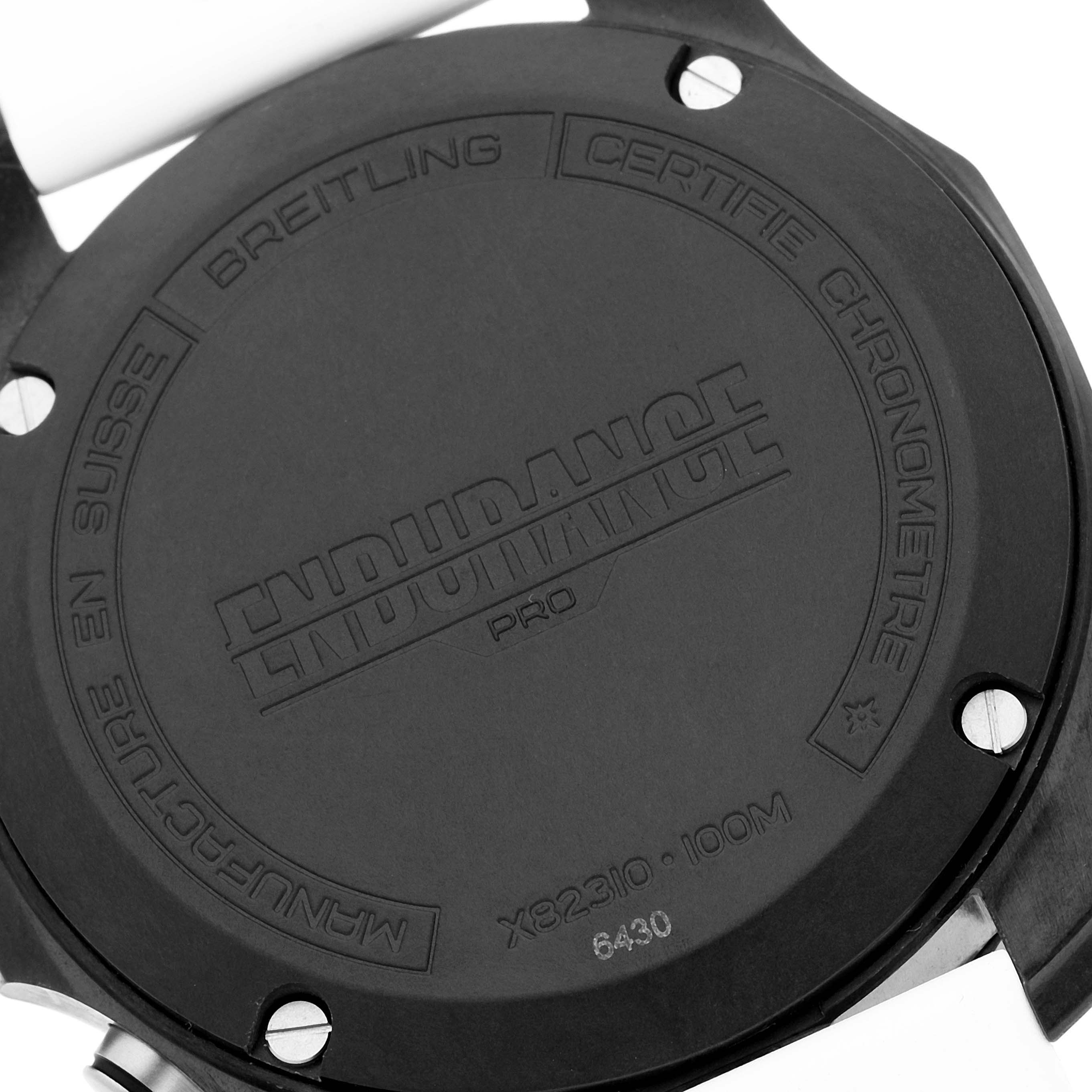 This image shows the back case of a Breitling Professional Series X82310 Men's Ceramic Black Dial X82310 Men's Ceramic Black Dial Endurance Pro watch, highlighting branding and model details.