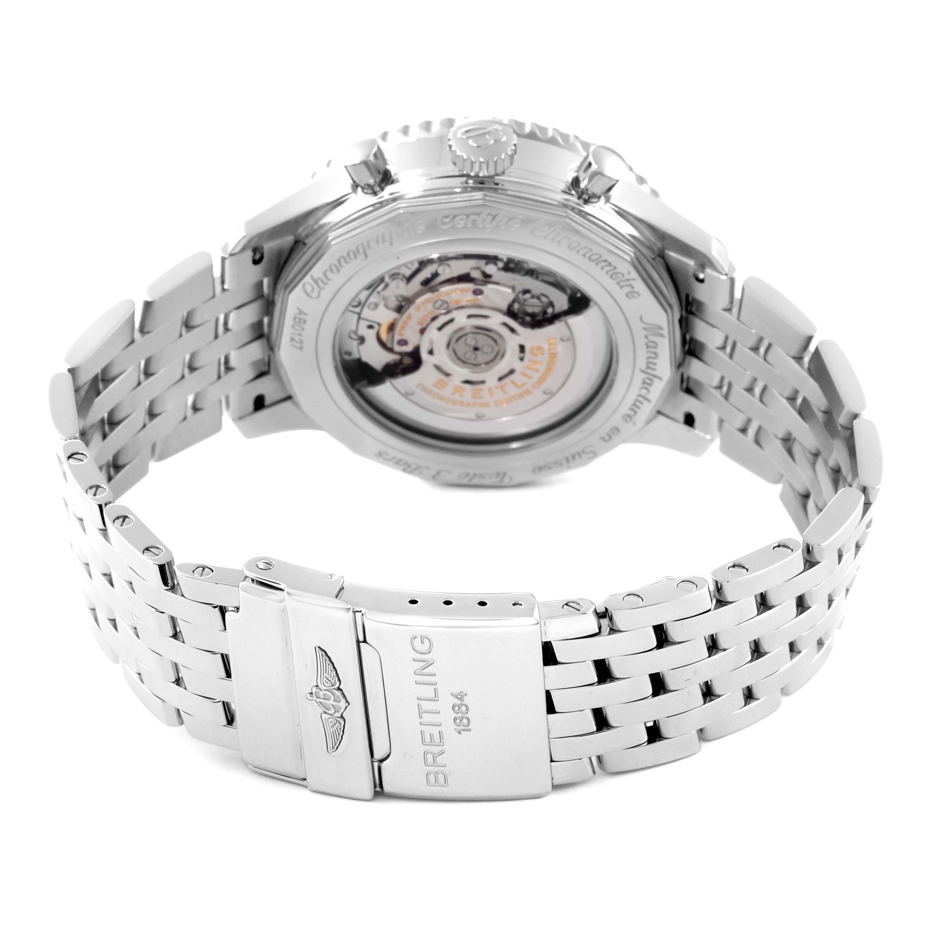 This image shows the back view of a Breitling Navitimer AB0127 Men's Stainless Steel Black Dial AB0127 Men's Stainless Steel Black Dial watch, highlighting the transparent case back and stainless steel bracelet clasp.