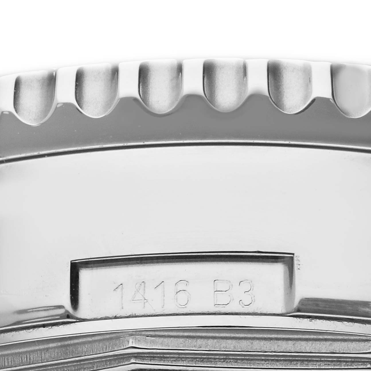 The image shows a close-up view of the bezel and side of the case of a Breitling Navitimer AB0127 Men's Stainless Steel Black Dial AB0127 Men's Stainless Steel Black Dial watch with an engraved serial number "1416 B3."