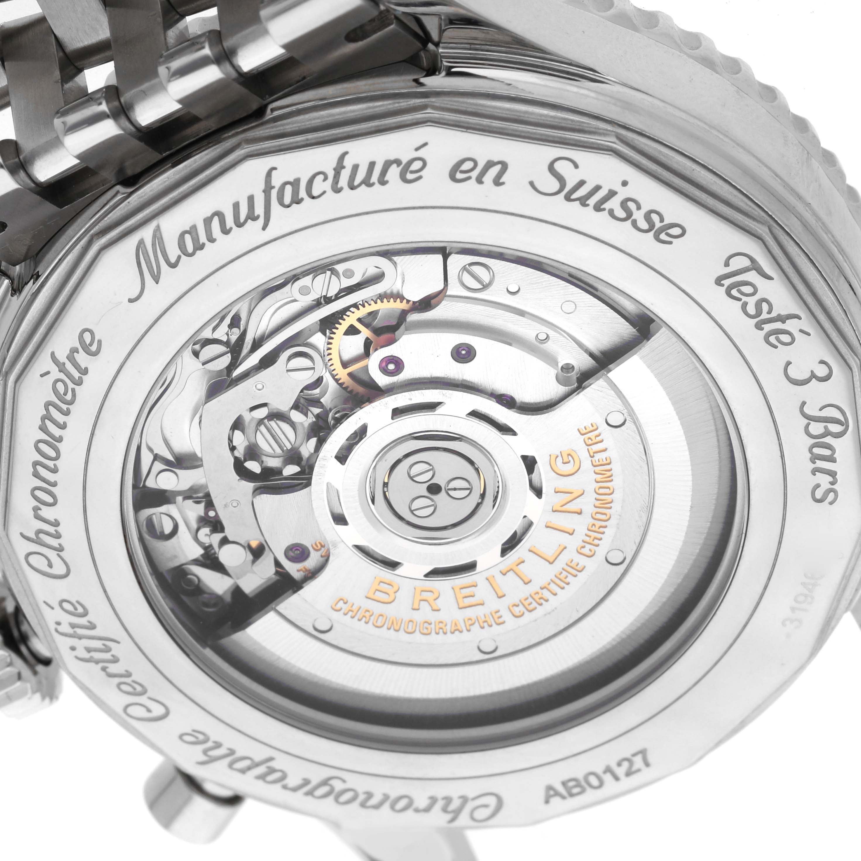 The image shows the back of the Breitling Navitimer AB0127 Men's Stainless Steel Black Dial AB0127 Men's Stainless Steel Black Dial watch, highlighting its intricate movement and inner mechanisms.