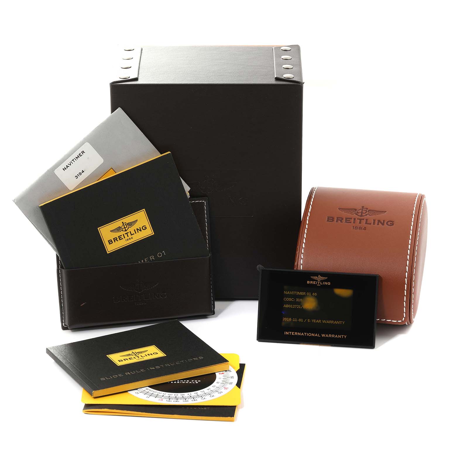 The image shows the packaging, manuals, warranty card, and accessories for the Breitling Navitimer AB0127 Men's Stainless Steel Black Dial AB0127 Men's Stainless Steel Black Dial watch.