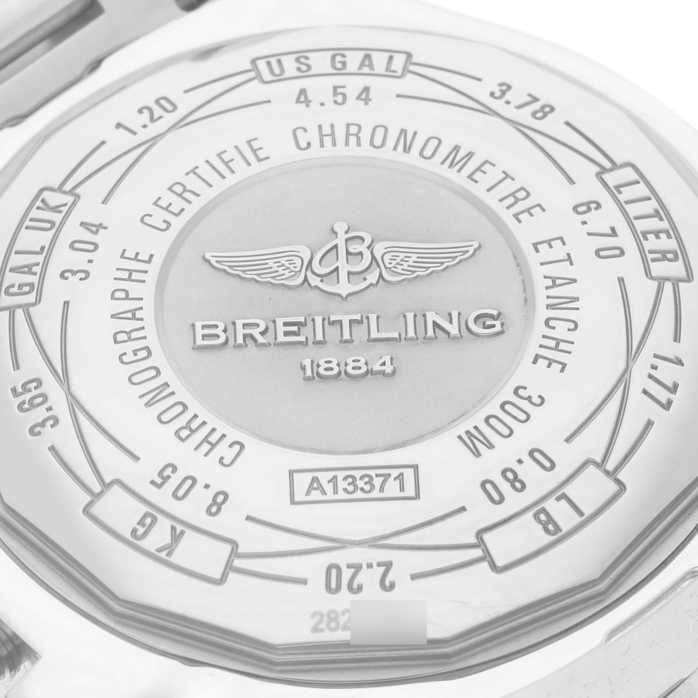 This image shows the case back of a Breitling Avenger A13371 Men's Stainless Steel Black Dial A13371 Men's Stainless Steel Black Dial watch, featuring various unit conversions and branding details.