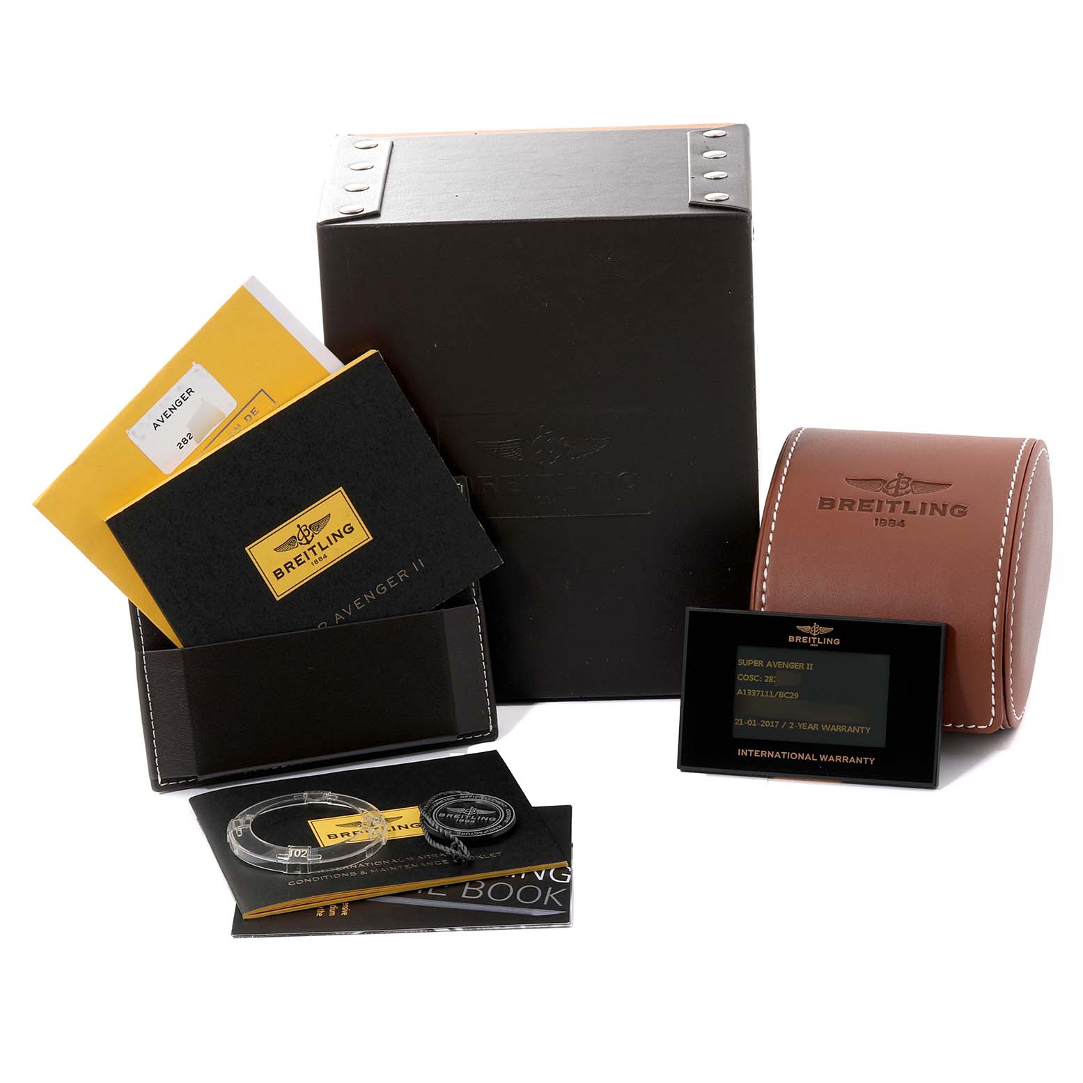 The image shows the Breitling Avenger A13371 Men's Stainless Steel Black Dial A13371 Men's Stainless Steel Black Dial watch packaging, instruction manuals, warranty card, and a watch case from a frontal angle.