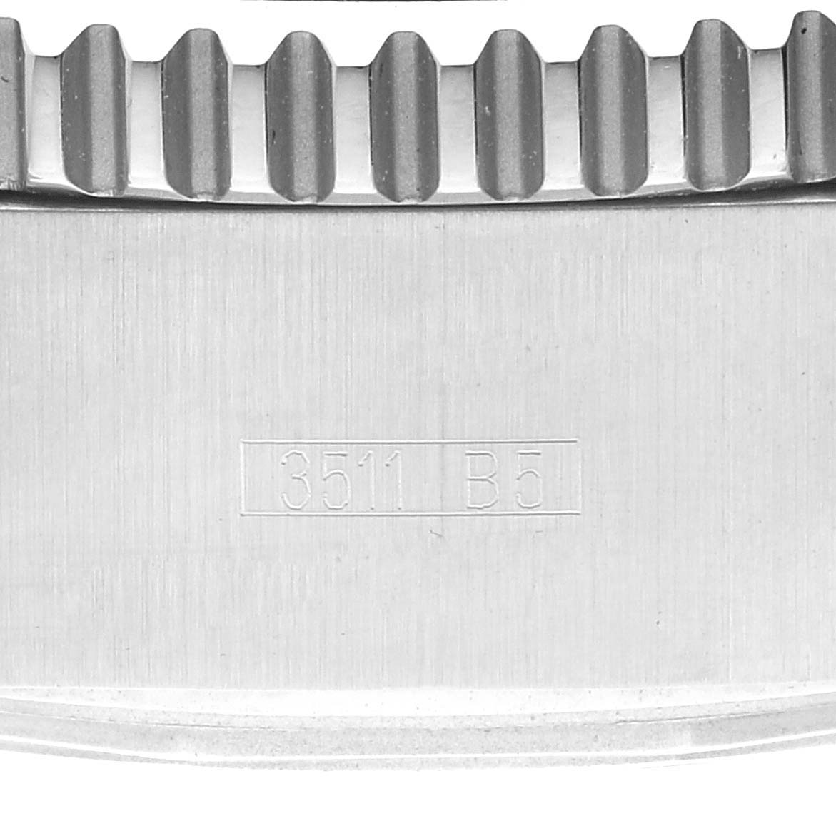 The image shows a close-up of the bezel and case side of a Breitling Superocean A13341 Men's Stainless Steel Black Dial A13341 Men's Stainless Steel Black Dial watch, featuring gear-like notches and an engraved number.