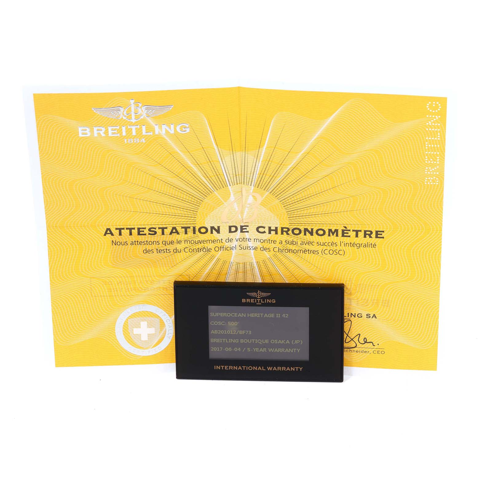 The image shows a warranty card and a chronometer certificate for the Breitling Superocean AB2010161C1A1 Men
s Stainless Steel Black Dial AB2010161C1A1 Men
s Stainless Steel Black Dial model.