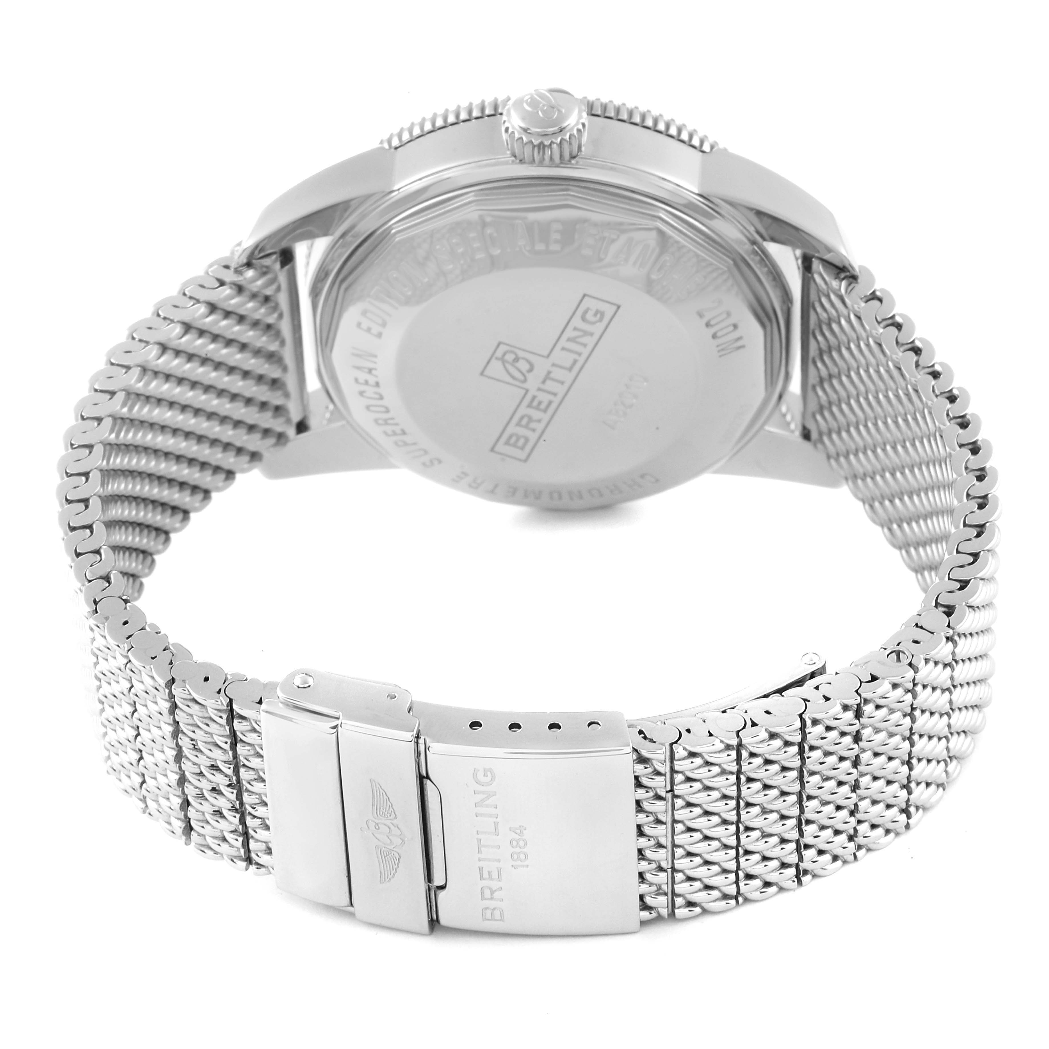 This image shows the back view and clasp of a Breitling Superocean AB2010161C1A1 Men
s Stainless Steel Black Dial AB2010161C1A1 Men
s Stainless Steel Black Dial watch, highlighting its metal mesh band and engraved case back.
