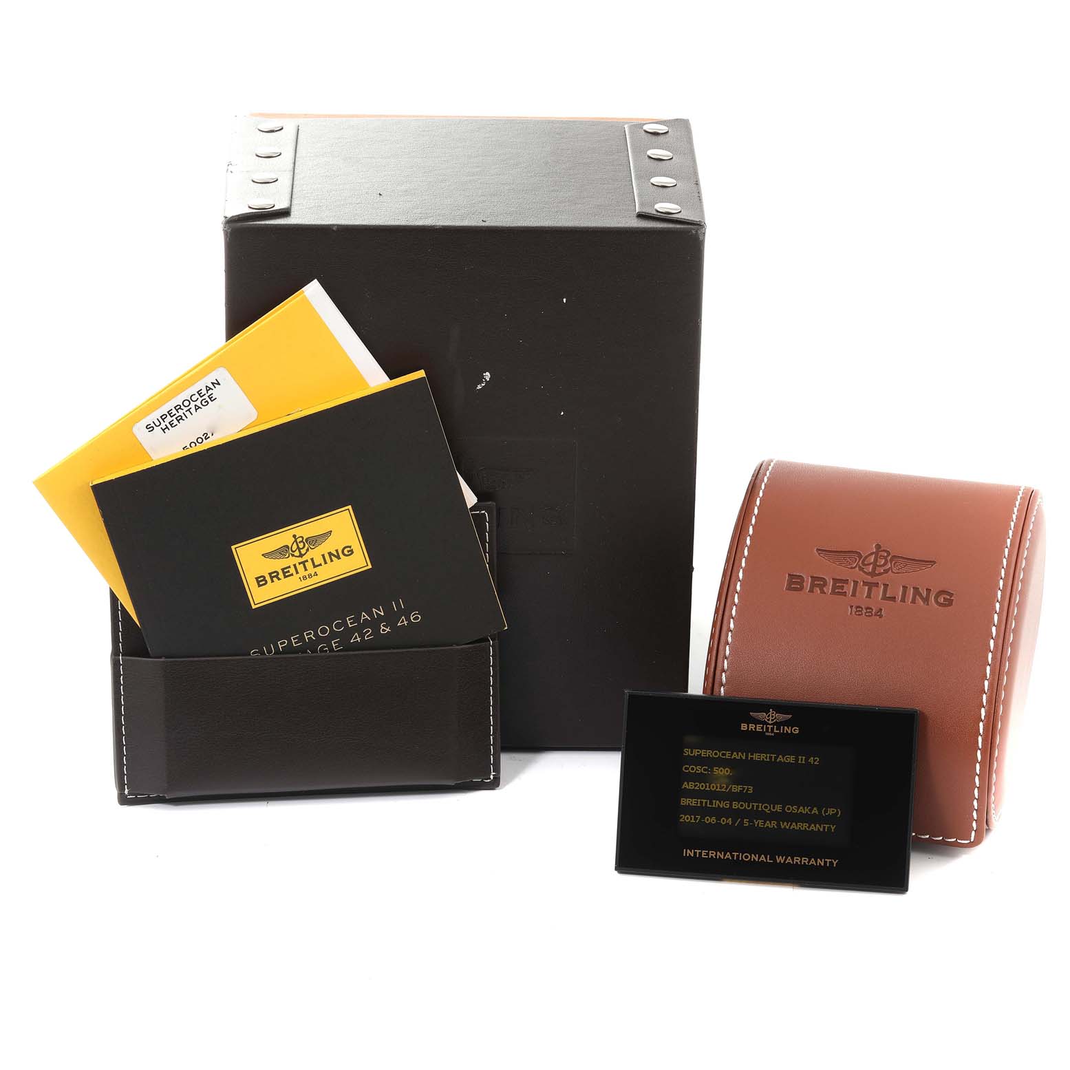 The image displays Breitling Superocean AB2010161C1A1 Men
s Stainless Steel Black Dial AB2010161C1A1 Men
s Stainless Steel Black Dial watch accessories, including boxes, manuals, and an international warranty card, in a front-facing angle.