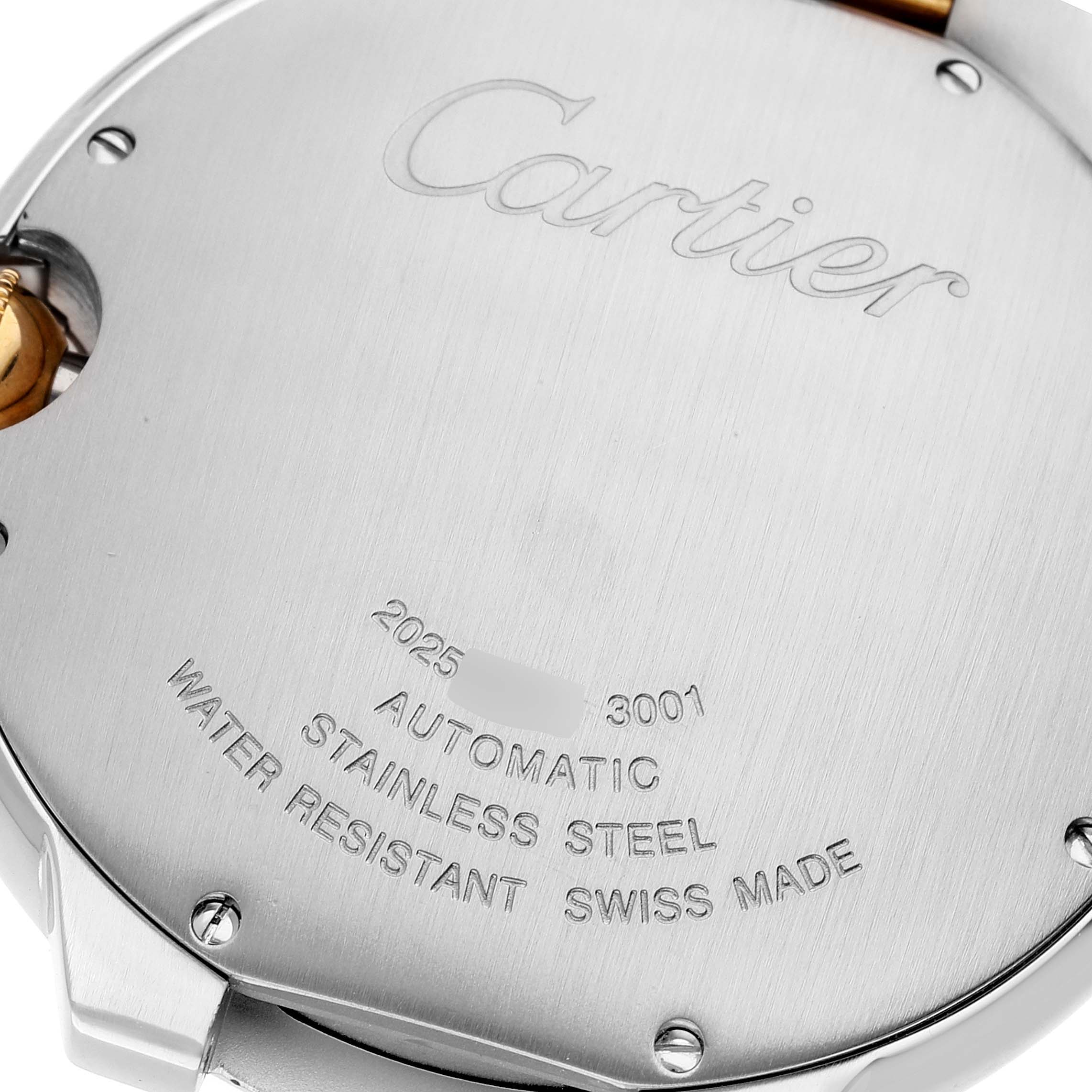 The image shows the engraved back case of a Cartier Ballon Bleu W6900923 Men
s Steel and Gold (two tone) Silver Dial W6900923 Men
s Steel and Gold (two tone) Silver Dial watch, highlighting specifications like automatic movement and water resistance.