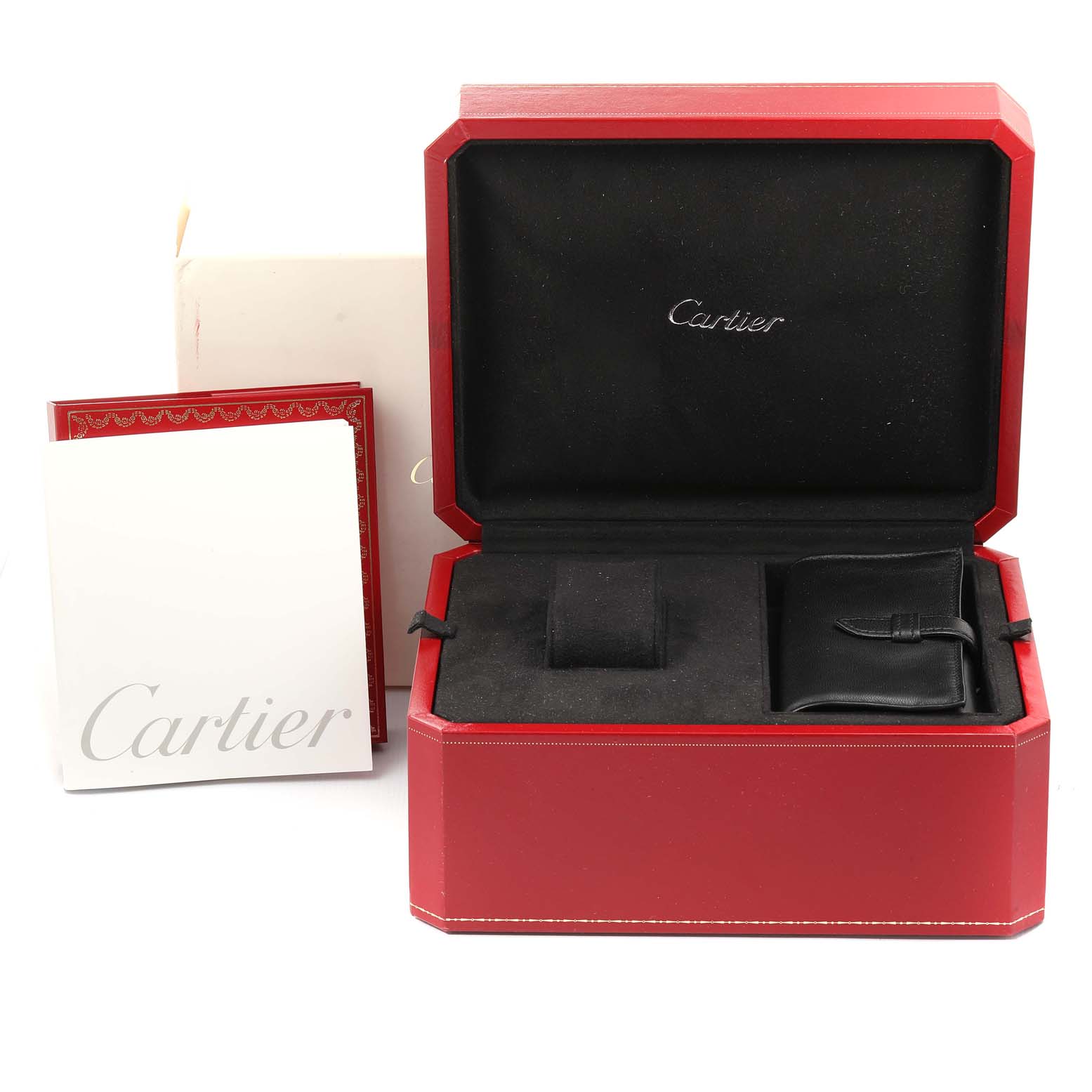 The image shows the open box, booklet, and watch accessories for the Cartier Roadster W62020X6 Men
s Stainless Steel Black Dial W62020X6 Men
s Stainless Steel Black Dial model.