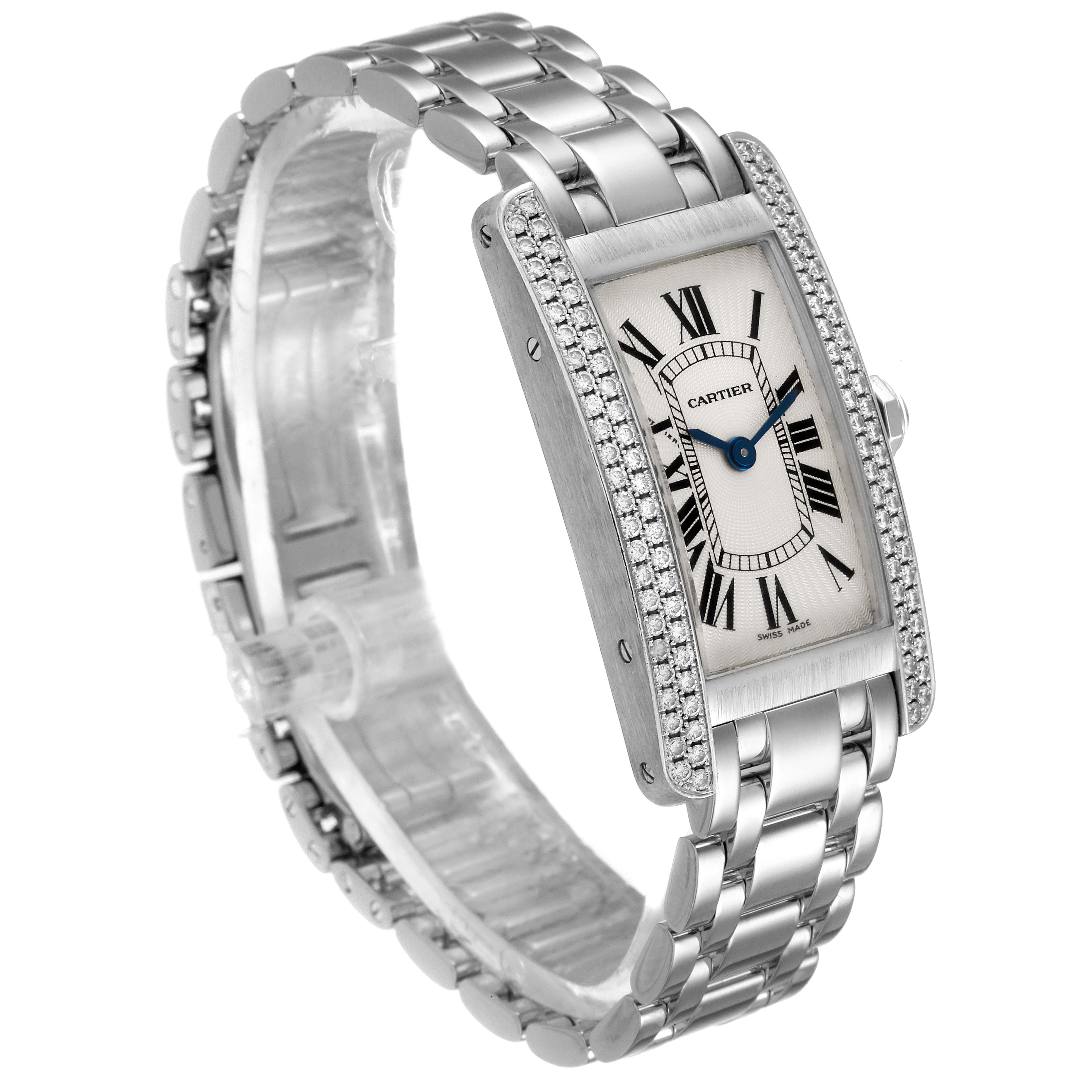 The Cartier Tank Americaine WB7018L1 Women
s White Gold Silver Dial WB7018L1 Women
s White Gold Silver Dial watch is shown at an angle highlighting its rectangular face, Roman numeral dial, and metal bracelet.