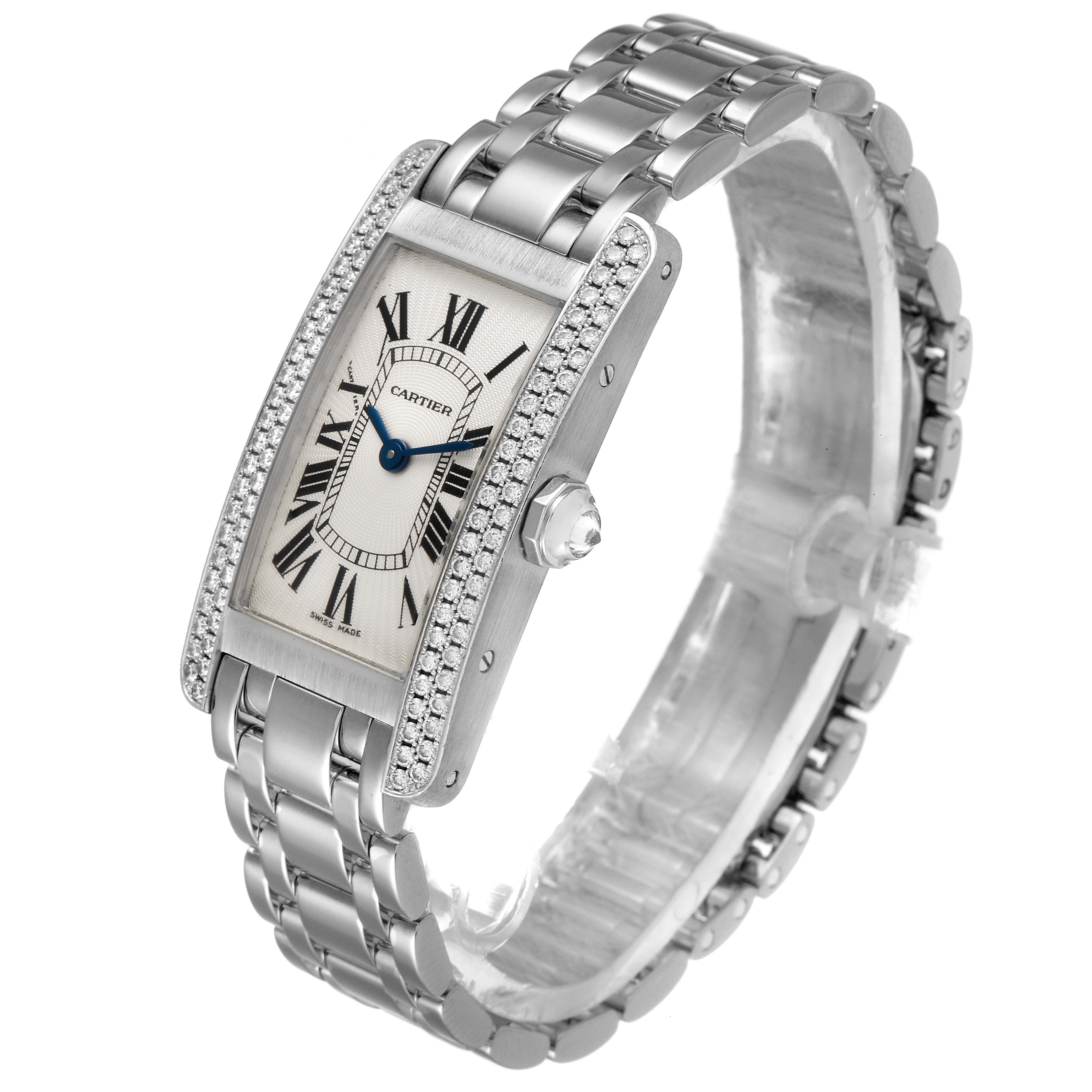The image shows a Cartier Tank Americaine WB7018L1 Women
s White Gold Silver Dial WB7018L1 Women
s White Gold Silver Dial watch at an angled side view, featuring its face, bracelet, and crown.