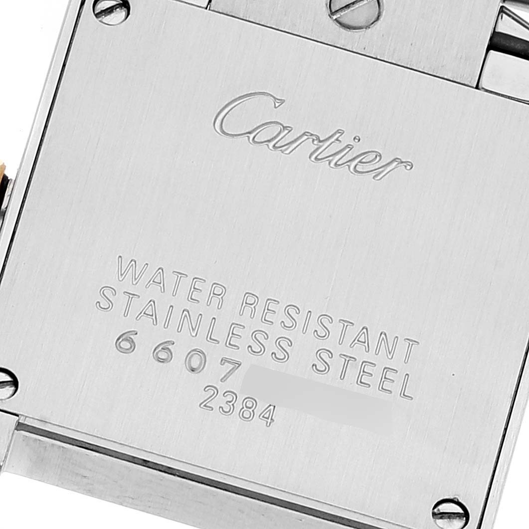 This image shows the back case of a Cartier Tank Française watch, highlighting its water resistance and stainless steel features.